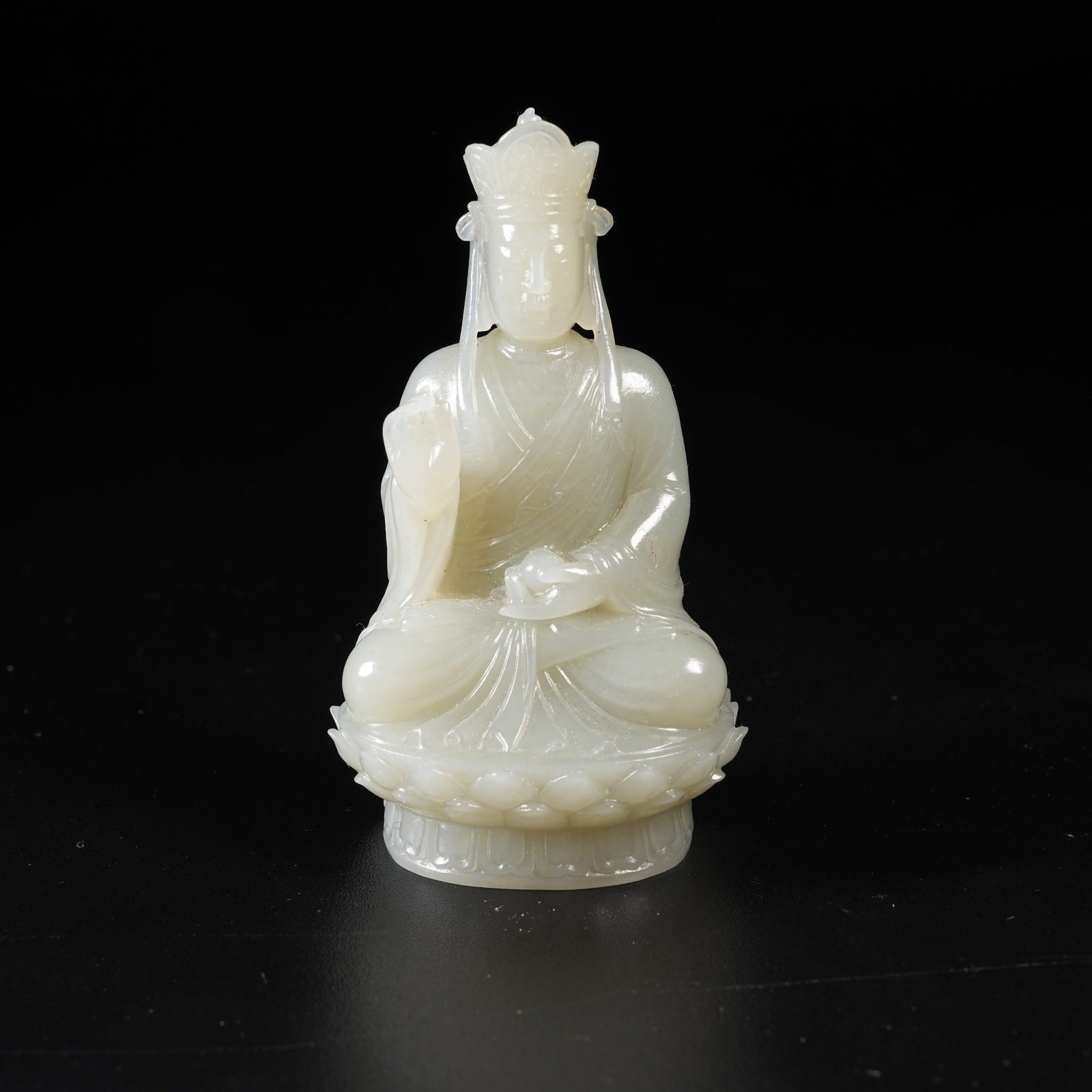 A HETIAN JADE MEDICINE BUDDHA FIGURE (1 of 9)