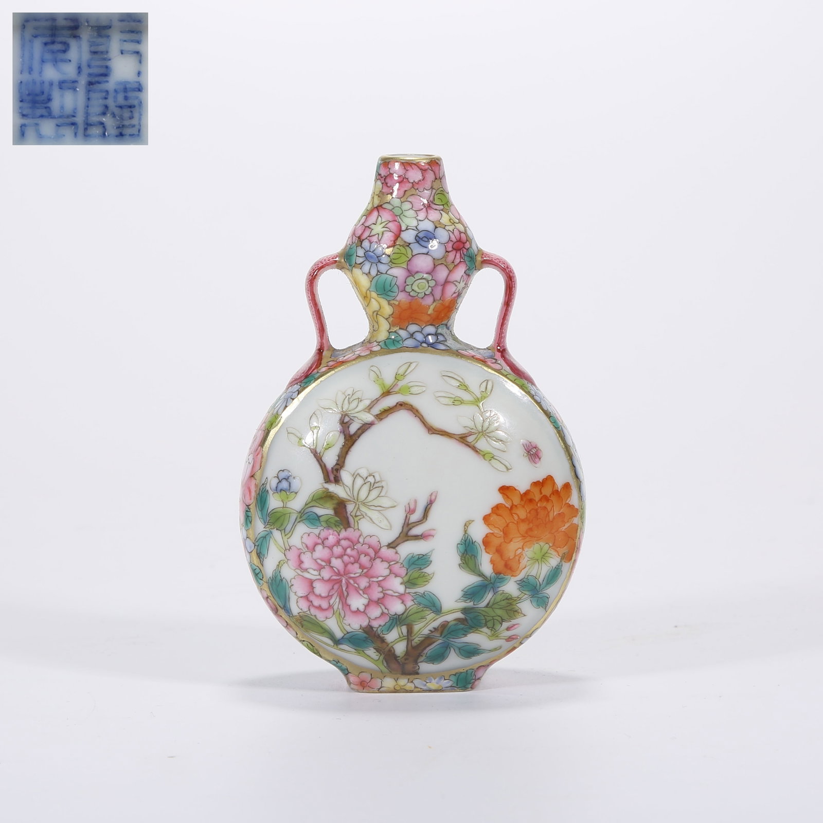 A FAMILLE ROSE GOURD-SHAPED SMALL VASE WITH FLORAL PATTERN AND RIBBON HANDLES: Famille Rose Gourd-Shaped Small Vase with Floral Pattern and Ribbon Handles