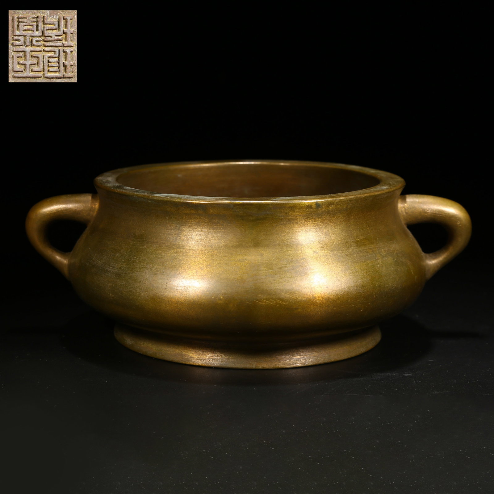 A BRONZE CENSER WITH LOOP HANDLES (1 of 9)