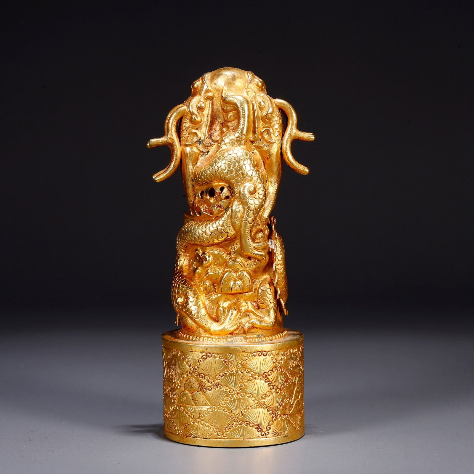 A GILT BRONZE SEAL WITH CHI-DRAGON MOTIF (1 of 10)