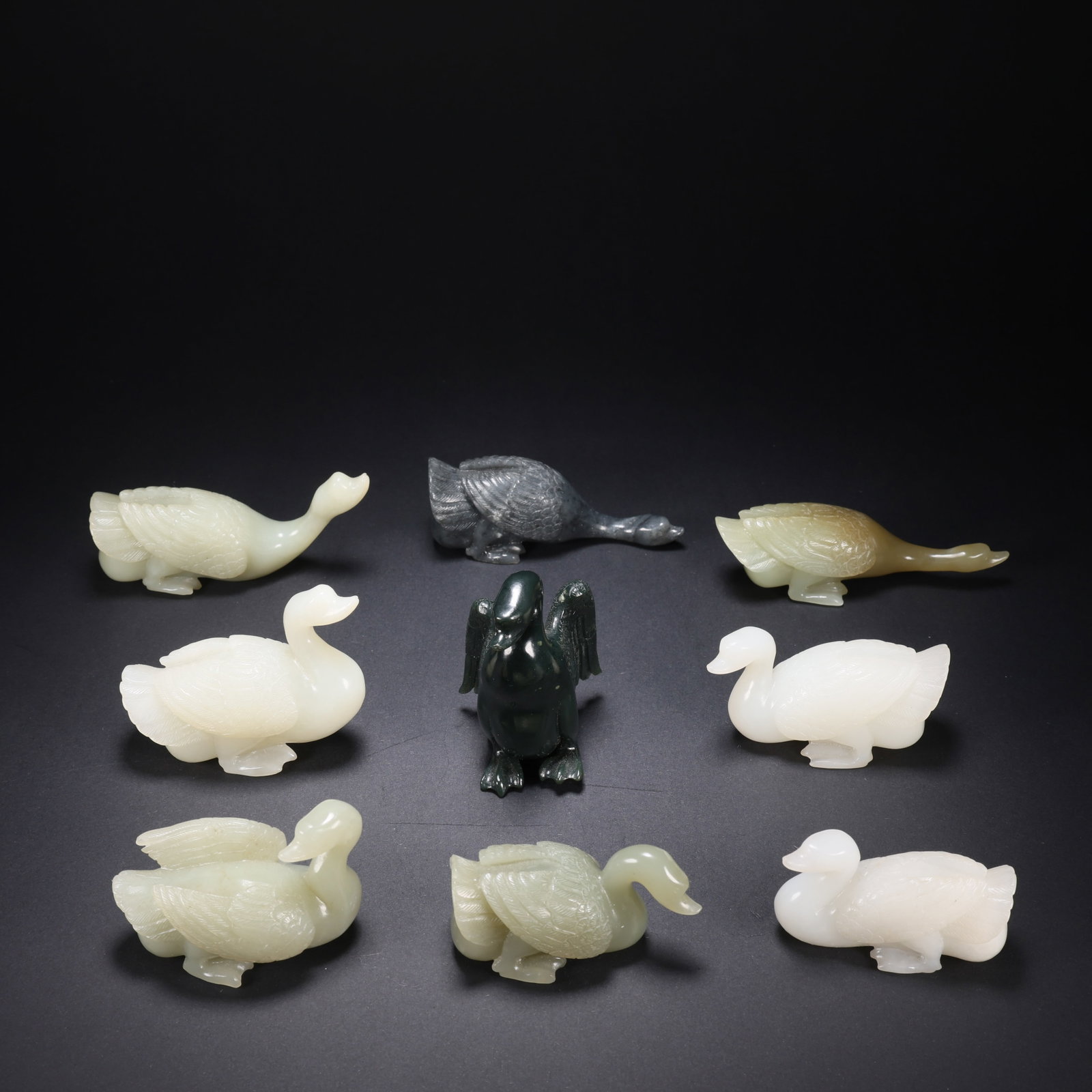 A HETIAN JADE SET OF NINE CELESTIAL GEESE (1 of 9)