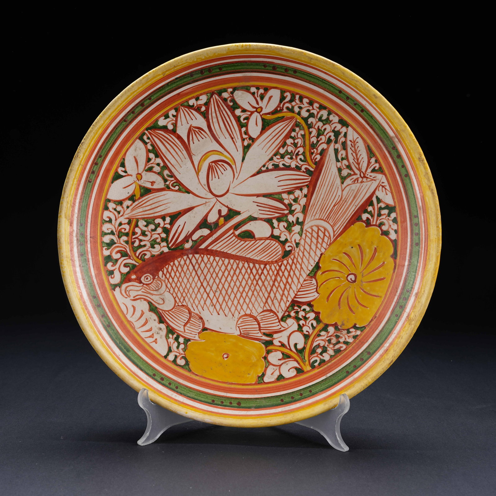 A TANG SANCAI LARGE DISH WITH LOTUS POND AND FISH MOTIF: Tang Sancai Large Dish with Lotus Pond and Fish Motif
