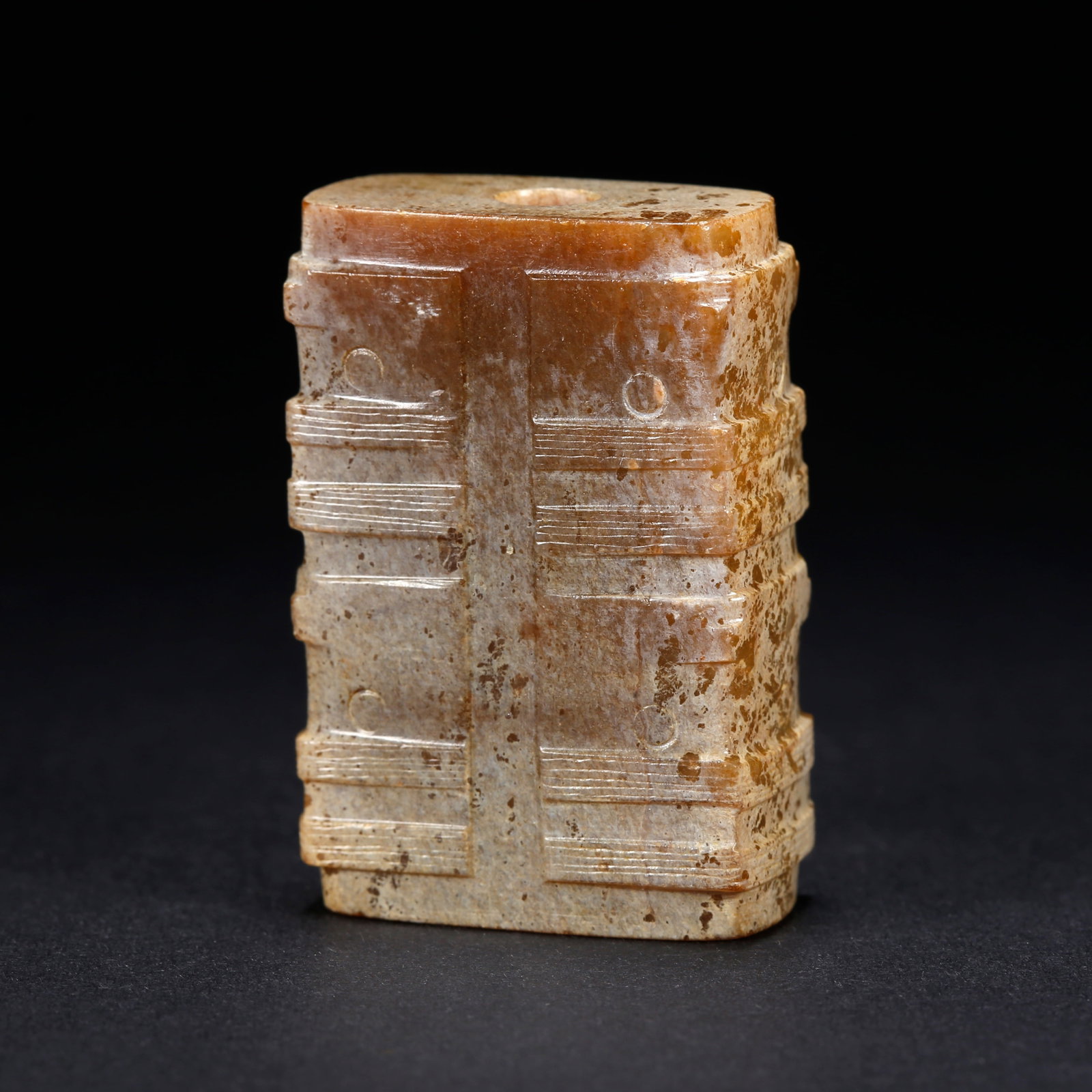 A ANCIENT JADE CONG WITH BEAST FACE MOTIF: Ancient Jade Cong with Beast Face Motif