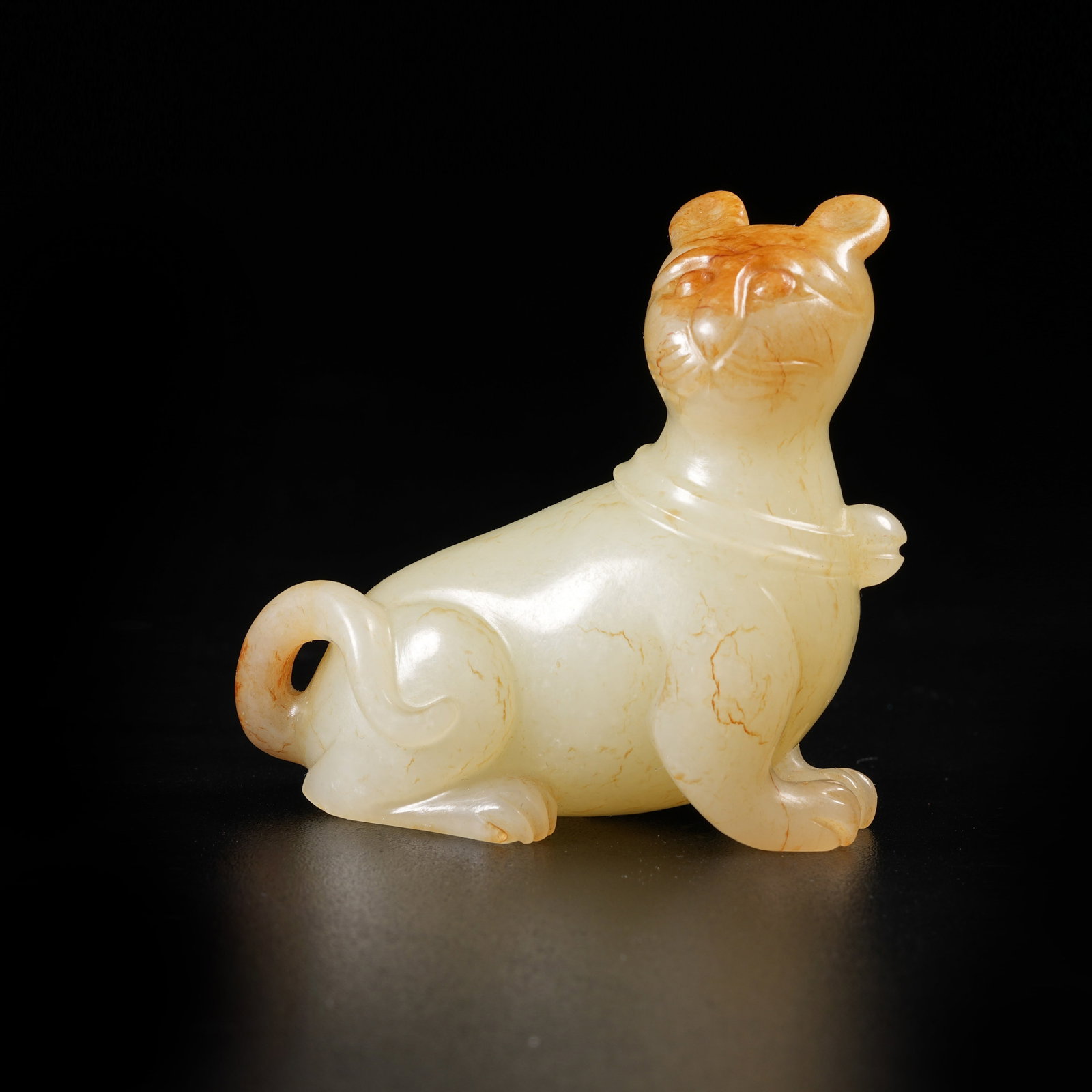 A HETIAN JADE AUSPICIOUS BEAST ORNAMENT (1 of 8)