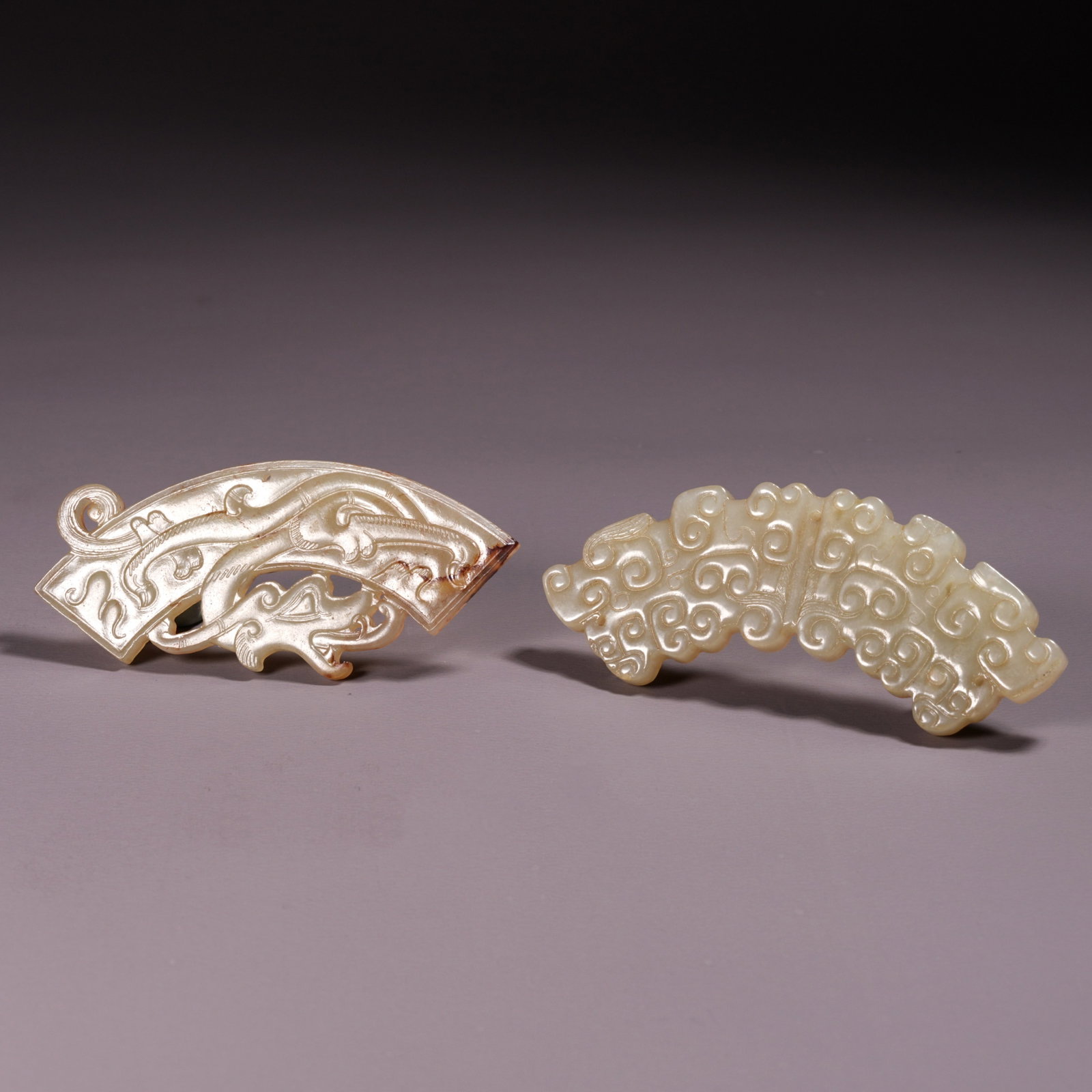 A SET OF HETIAN JADE HUANG (ARC-SHAPED PENDANT) (1 of 9)