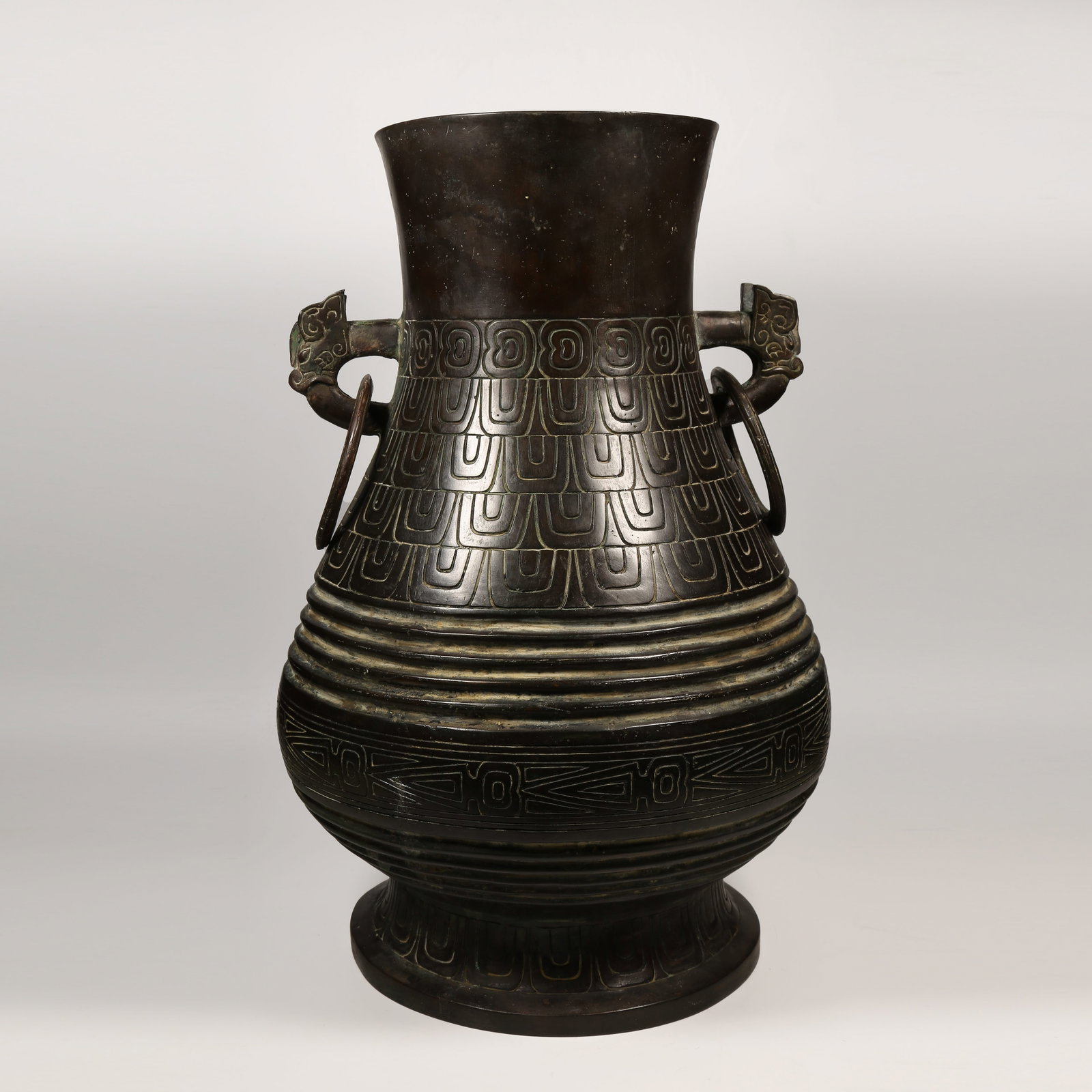A BRONZE KETTLE WITH STRING PATTERN AND ANIMAL-FORM HANDLES, HINGED LID (1 of 11)