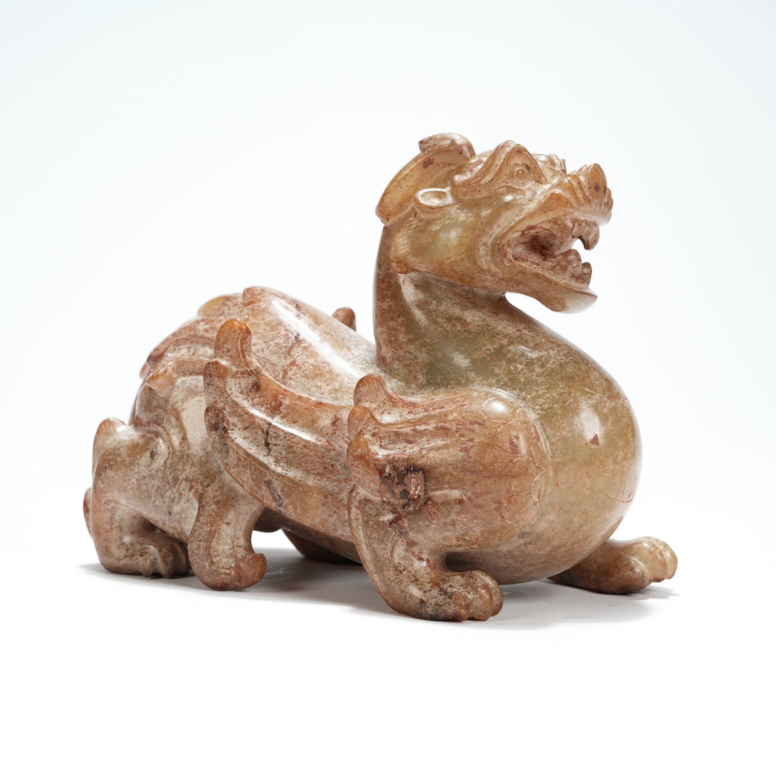 A ARCHAIC JADE AUSPICIOUS BEAST ORNAMENT (1 of 8)