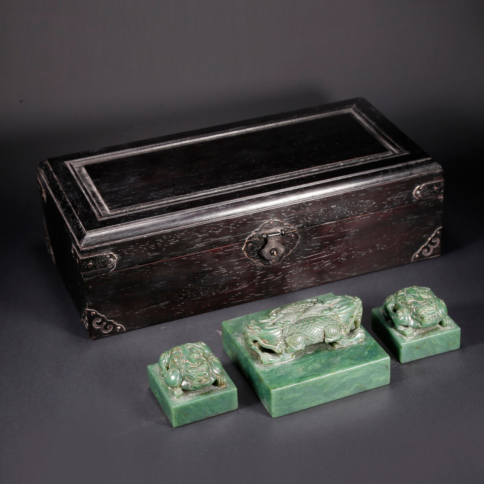A HETIAN BIYU DOUBLE-DRAGON SEAL SET (1 of 10)