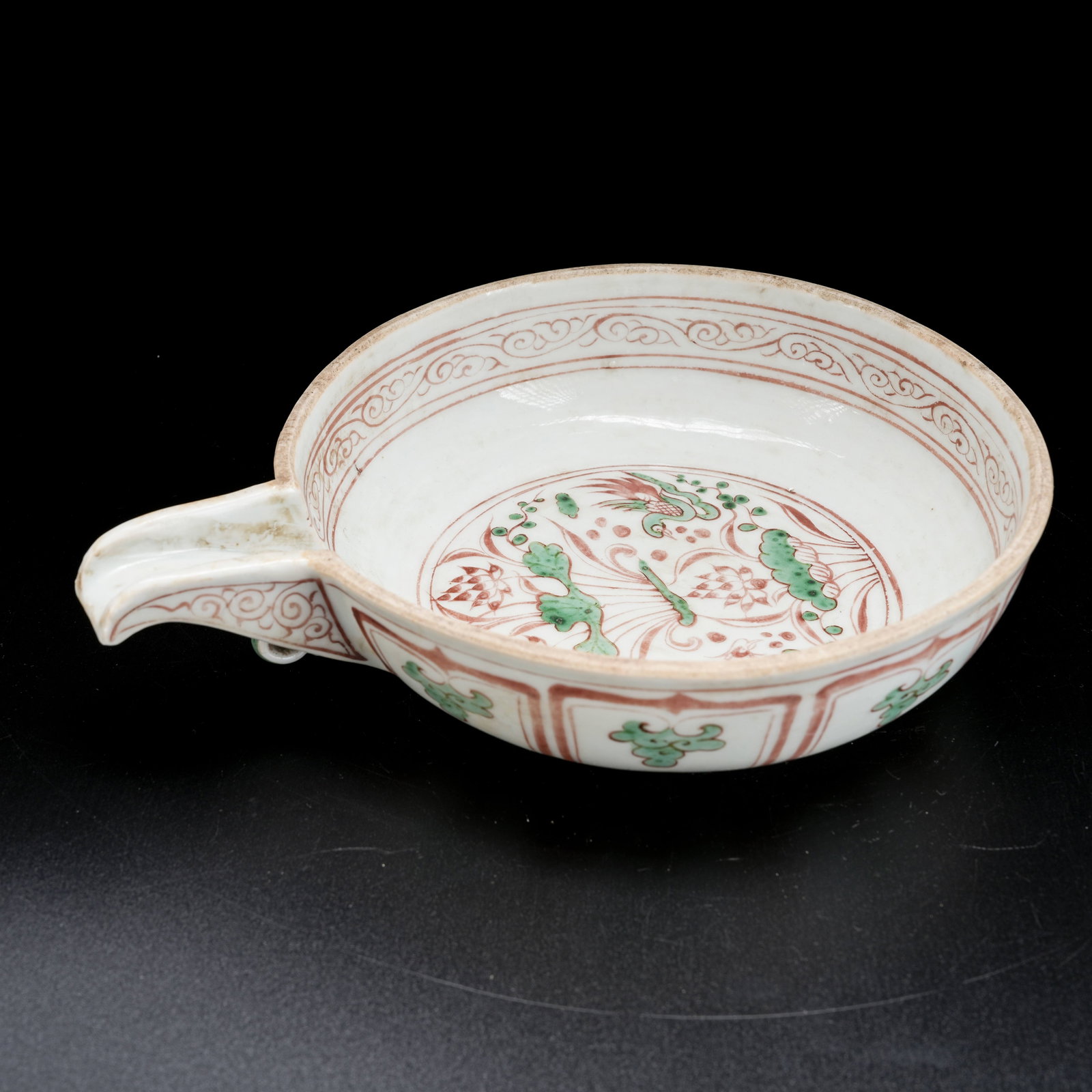 A RED AND GREEN ENAMEL WATER DROPPER WITH LOTUS POND AND MANDARIN DUCK MOTIF: Red and Green Enamel Water Dropper with Lotus Pond and Mandarin Duck Motif
