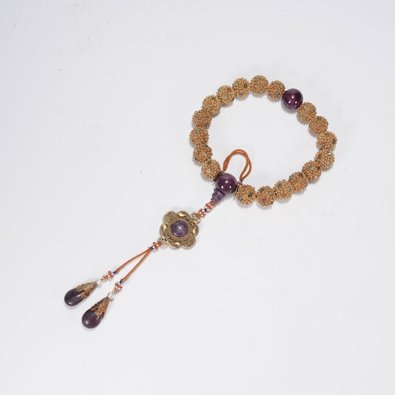 A SILVER GILT JEWEL INLAID PRAYER BEAD: Silver Gilt Jewel Inlaid Prayer Bead