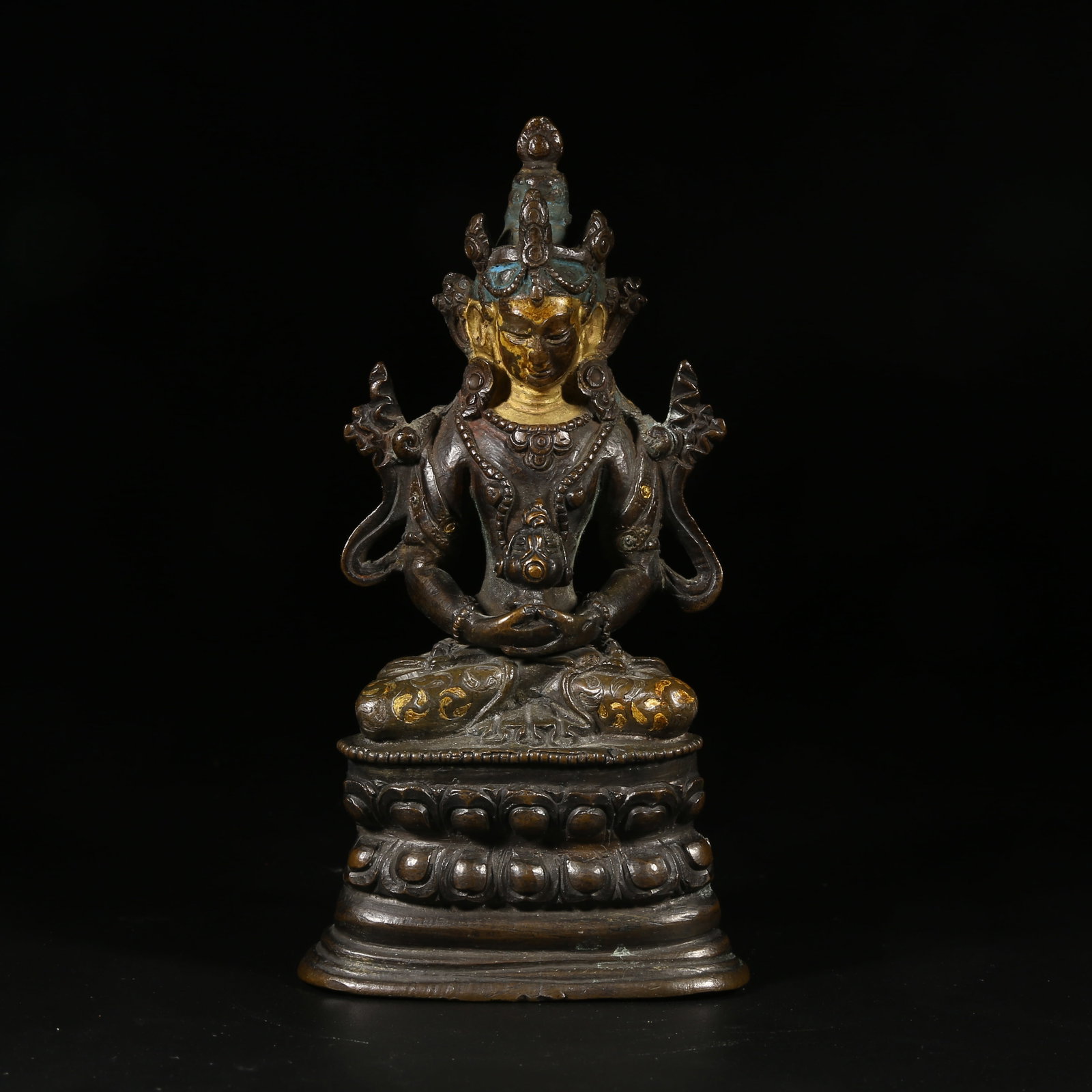 A BRONZE STATUE OF AMITAYUS IN "SNOW-MOUNTAIN WHITE" STYLE WITH MUD-GILDING (1 of 8)