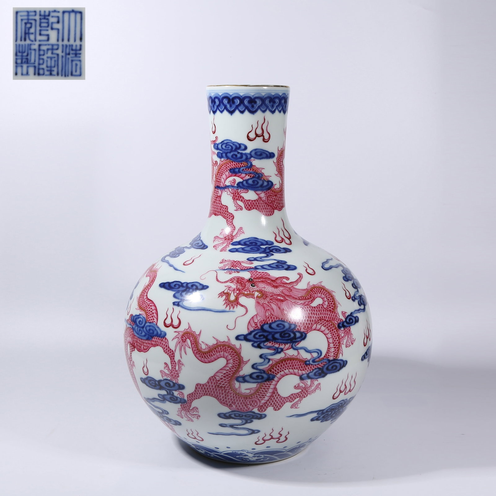 A BLUE AND WHITE WITH ROUGE DE FER "CLOUD AND DRAGON" PATTERN TIANQIUPING VASE (1 of 9)