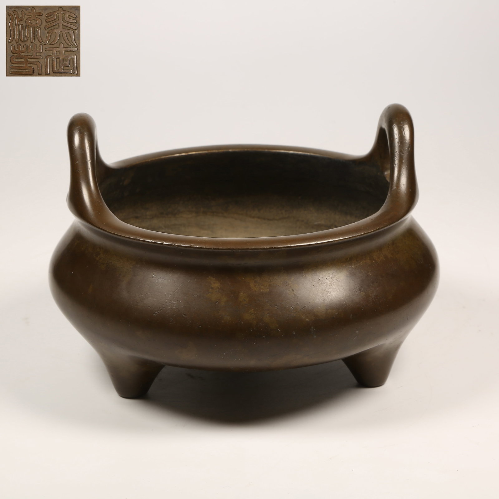 A BRONZE CENSER WITH THREE UPRIGHT LOOP HANDLES (1 of 9)