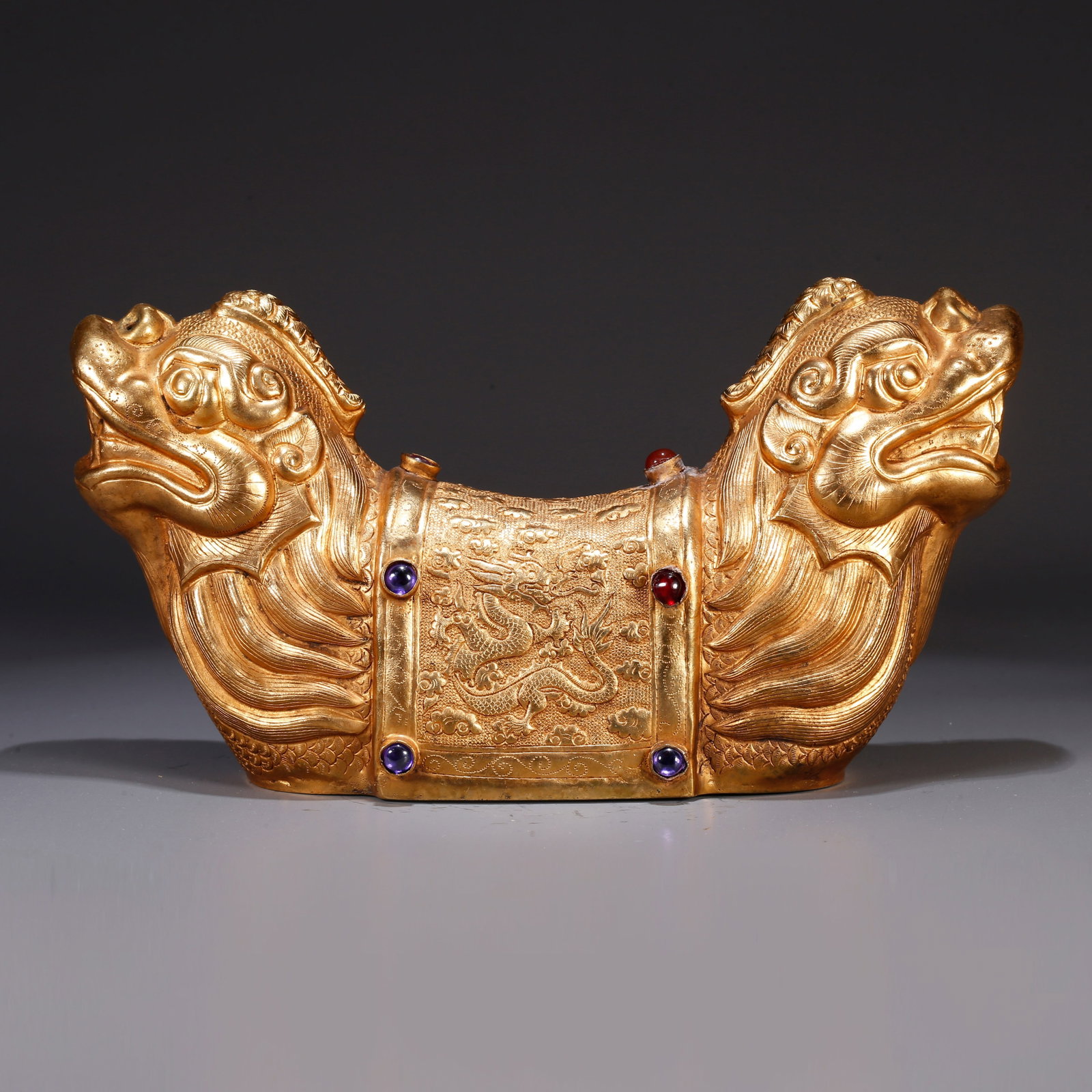 A GILT BRONZE PULSE DIAGNOSTIC TOOL WITH CLOUD AND DRAGON MOTIF (1 of 10)