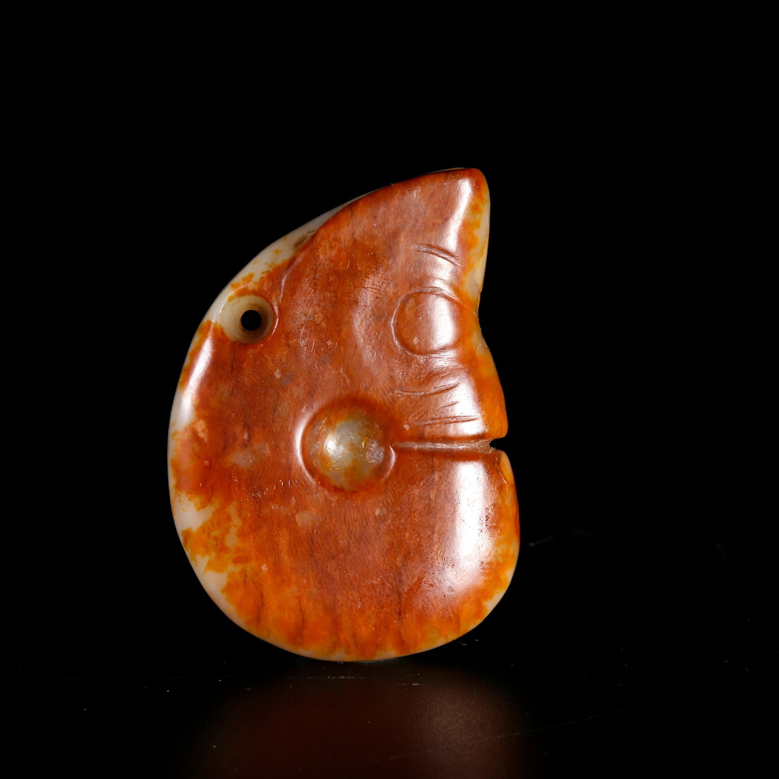 A HETIAN JADE CARVED PIG-DRAGON (ZHULONG) (1 of 10)