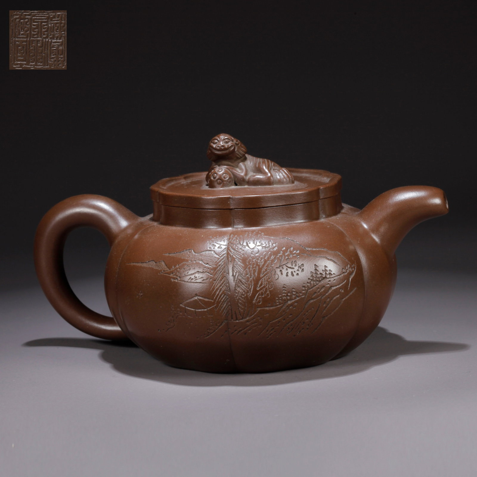A PURPLE CLAY (ZISHA) TEAPOT WITH LION KNOB: Purple Clay (Zisha) Teapot with Lion Knob