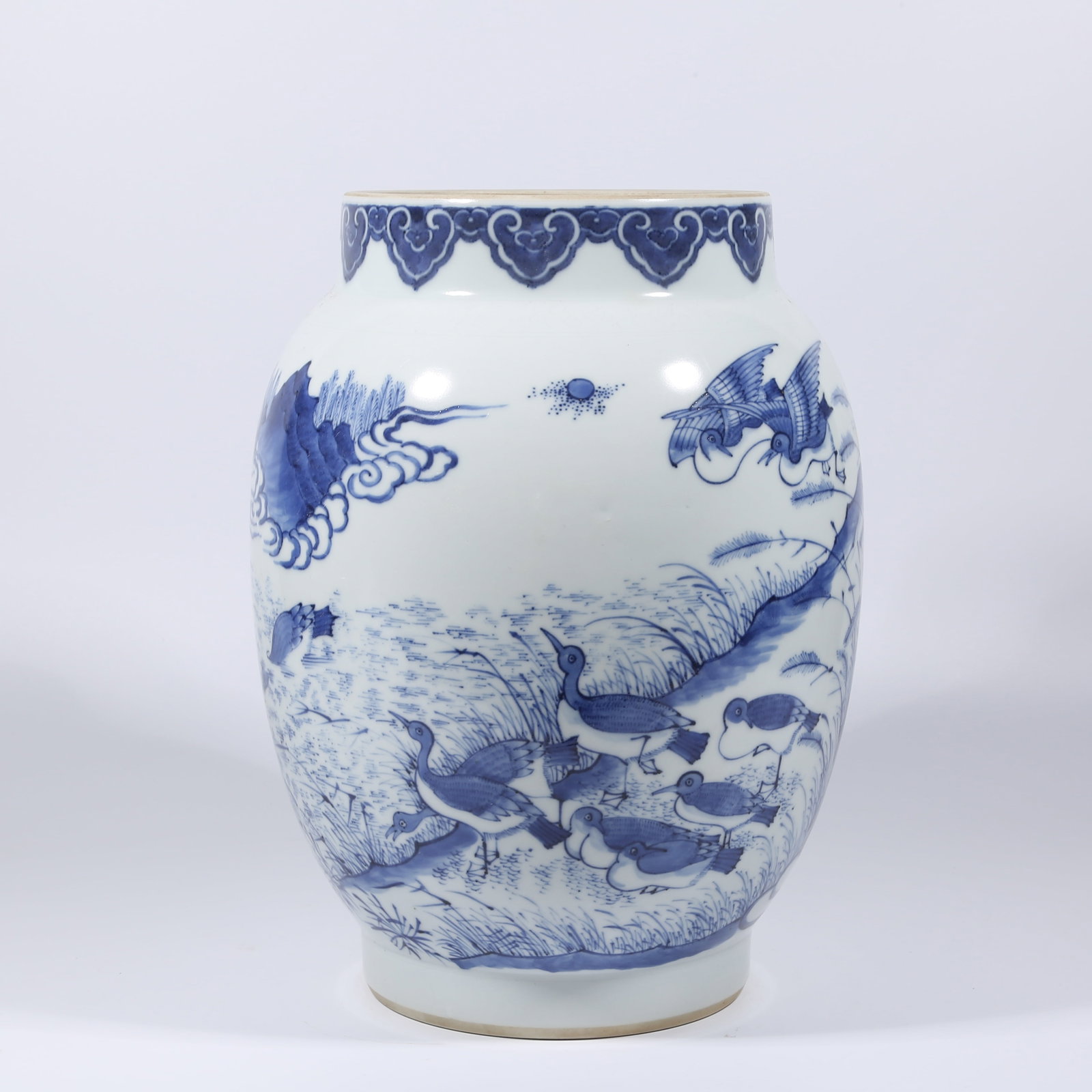 A BLUE AND WHITE JAR WITH FLOWER-AND-BIRD DESIGN (1 of 9)