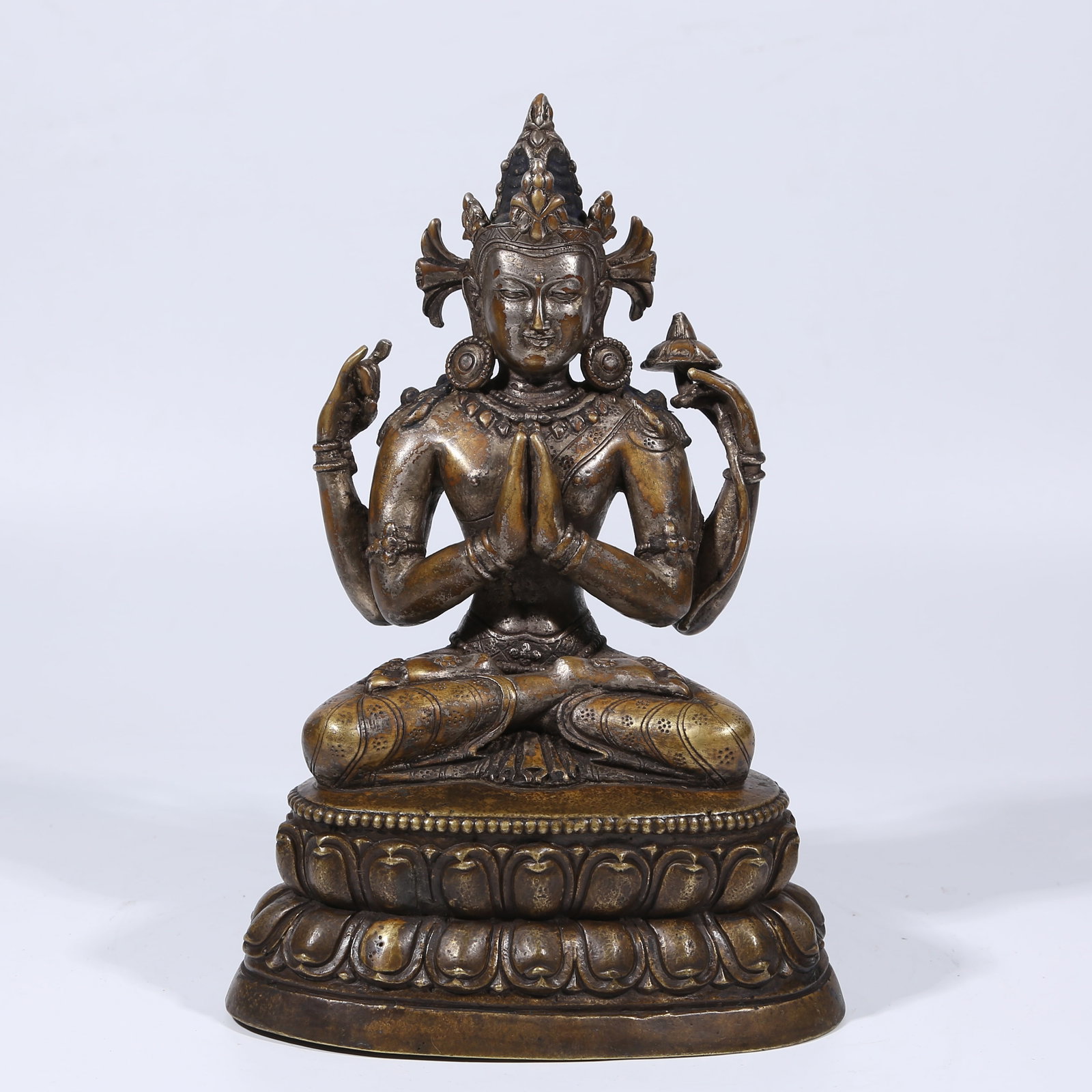 A GILT SILVER FOUR-ARMED AVALOKITESHVARA STATUE (1 of 8)
