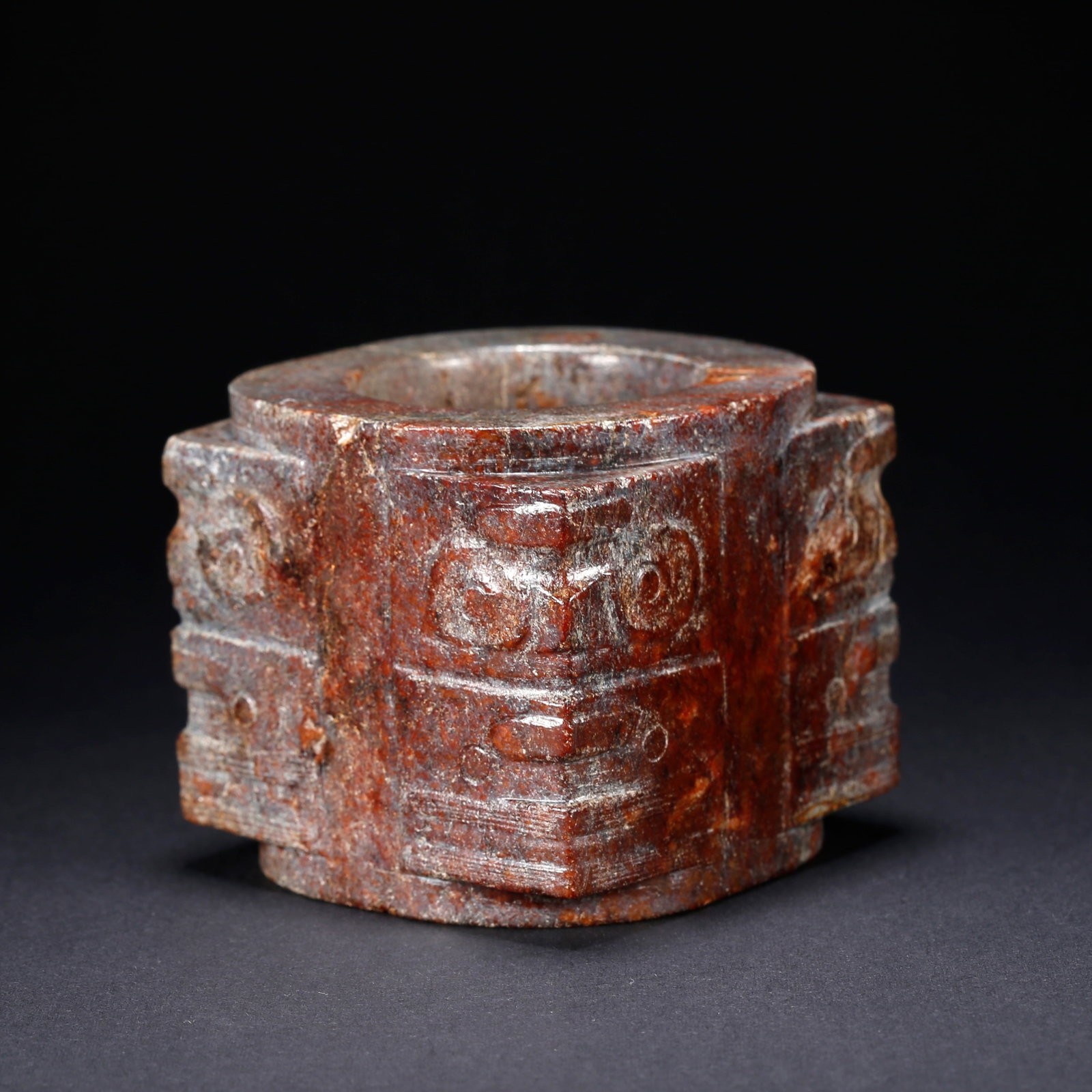 A ANCIENT JADE CONG WITH BEAST FACE MOTIF: Ancient Jade Cong with Beast Face Motif
