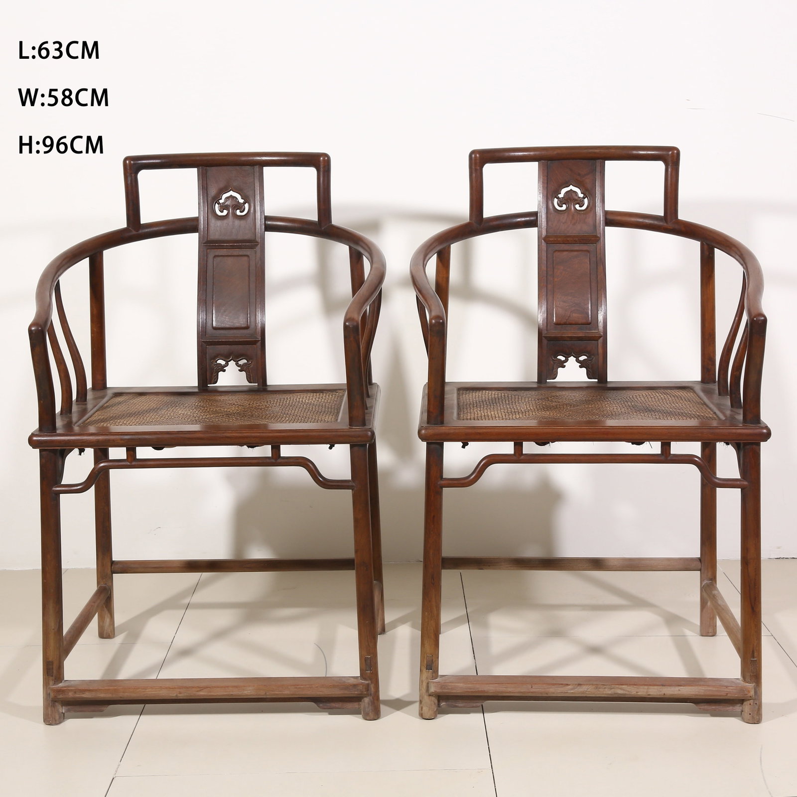 A SET OF HUANGHUALI ARMCHAIRS (1 of 11)