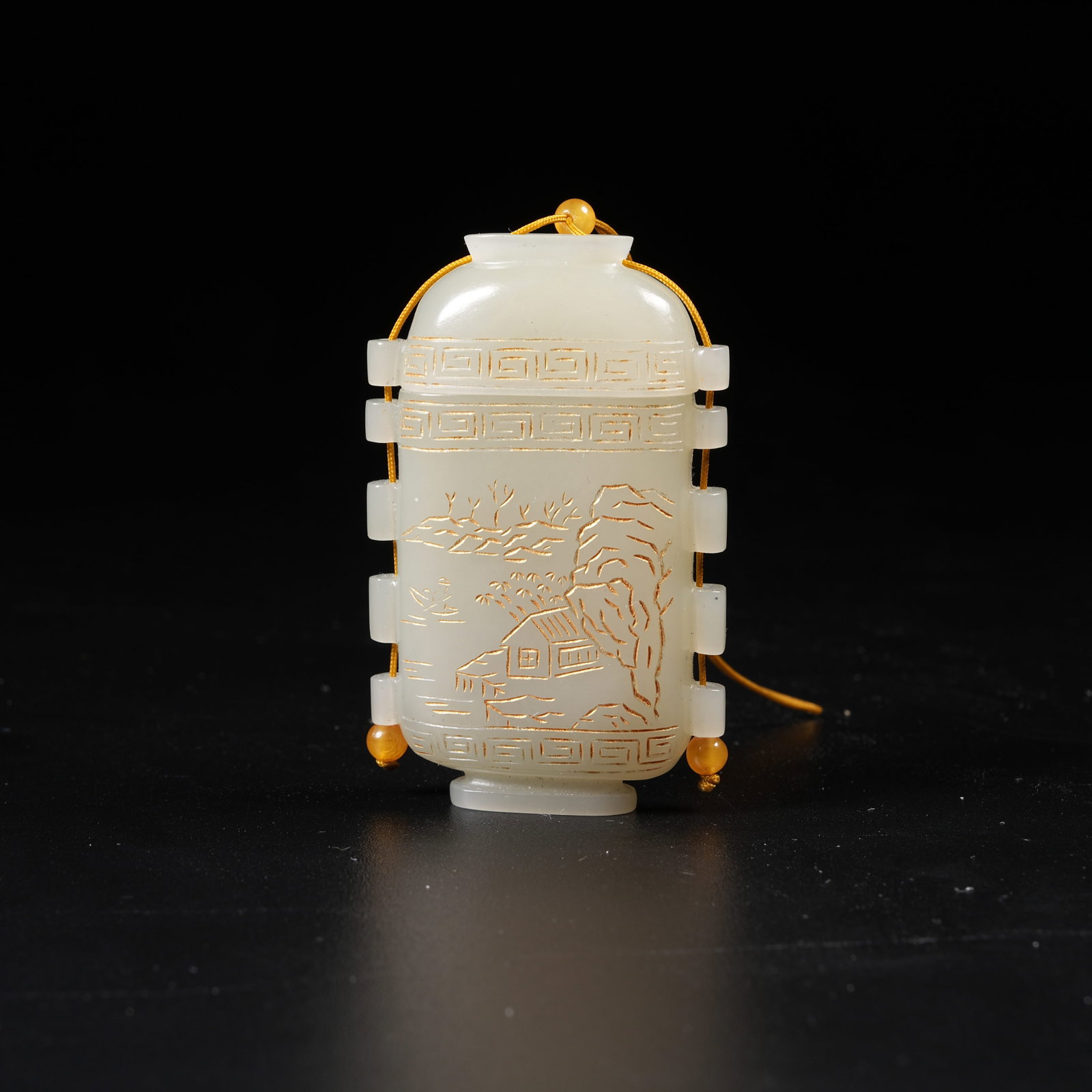 A HETIAN JADE GILT-DECORATED SACHET WITH LANDSCAPE MOTIF (1 of 8)