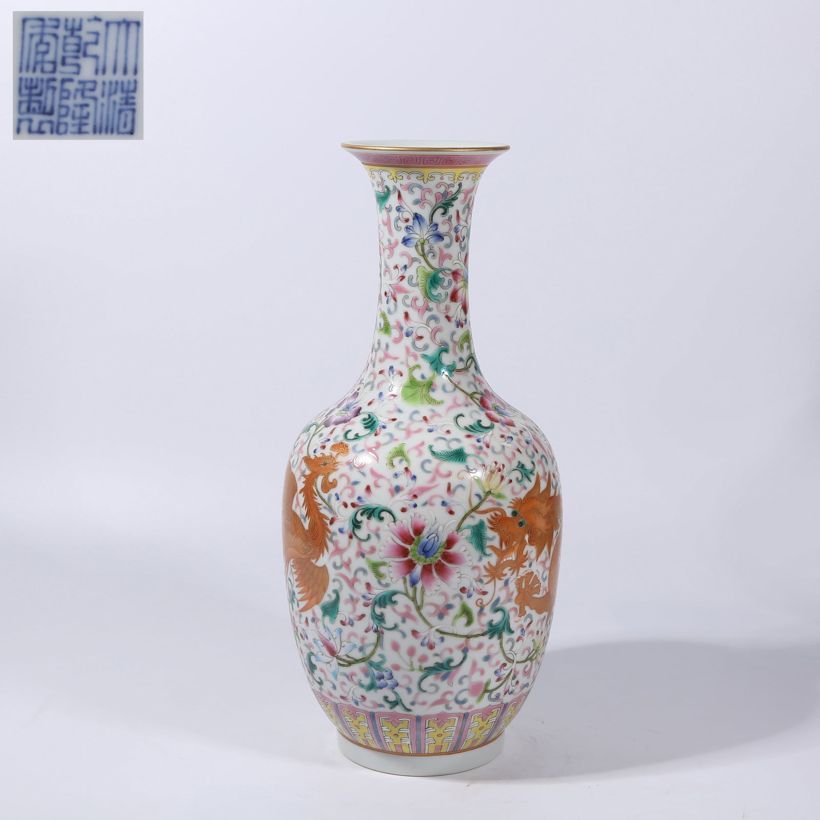 A FAMILLE ROSE "DRAGON AND PHOENIX THROUGH FLOWERS" APPRECIATION VASE: Famille rose "dragon and phoenix through flowers" appreciation vase