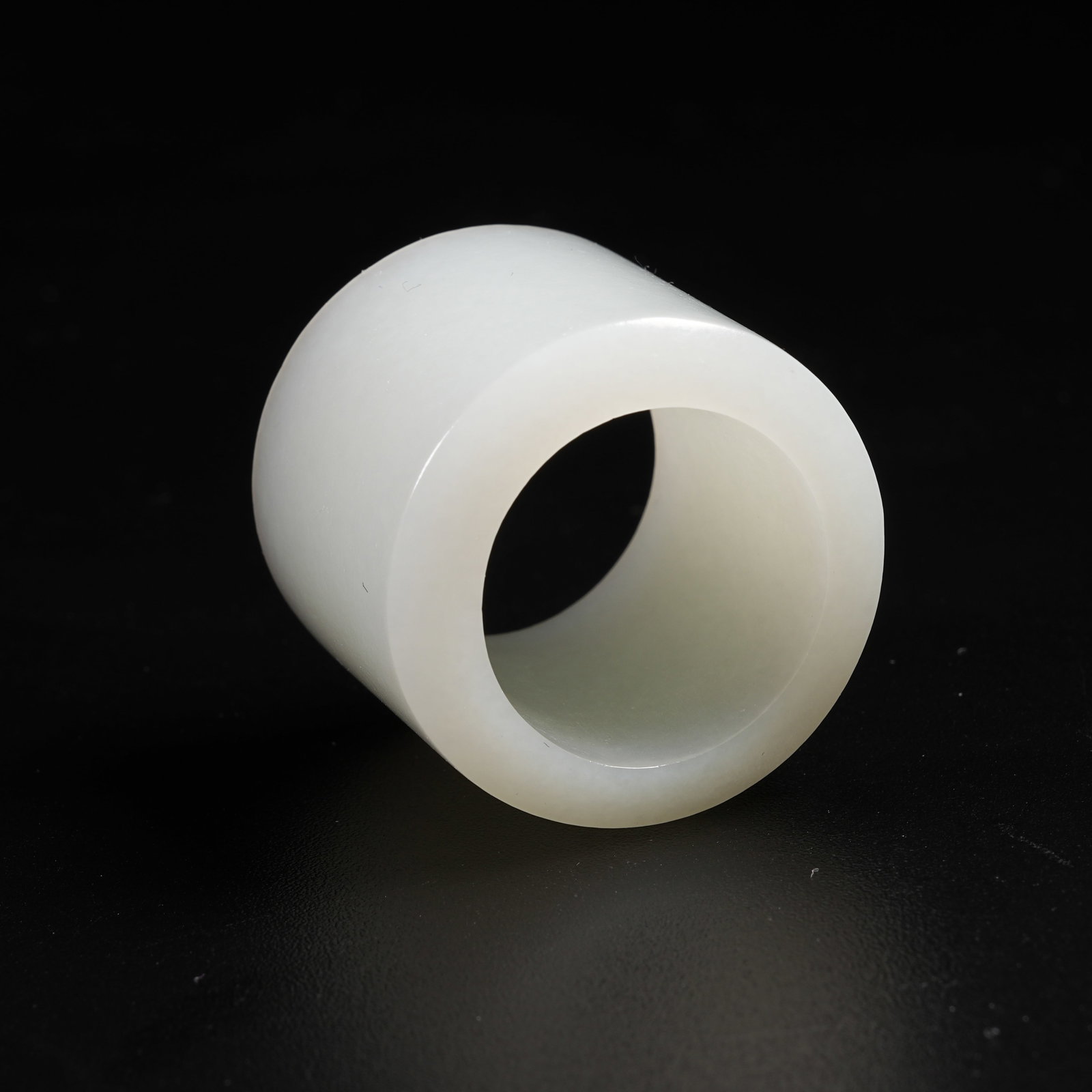A HETIAN WHITE JADE THUMB RING - 7