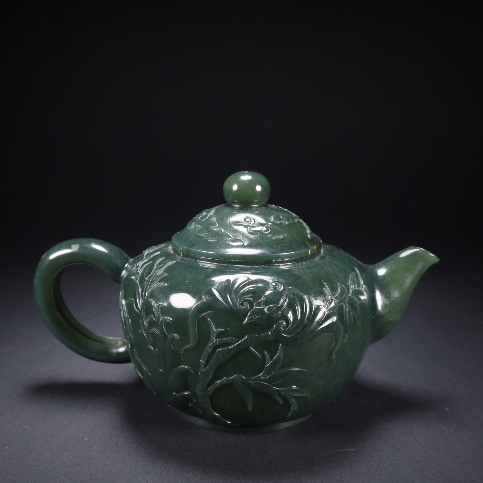 A HETIAN BIYU FLOWER-AND-PLANT TEAPOT: Hetian Biyu Flower-and-Plant Teapot