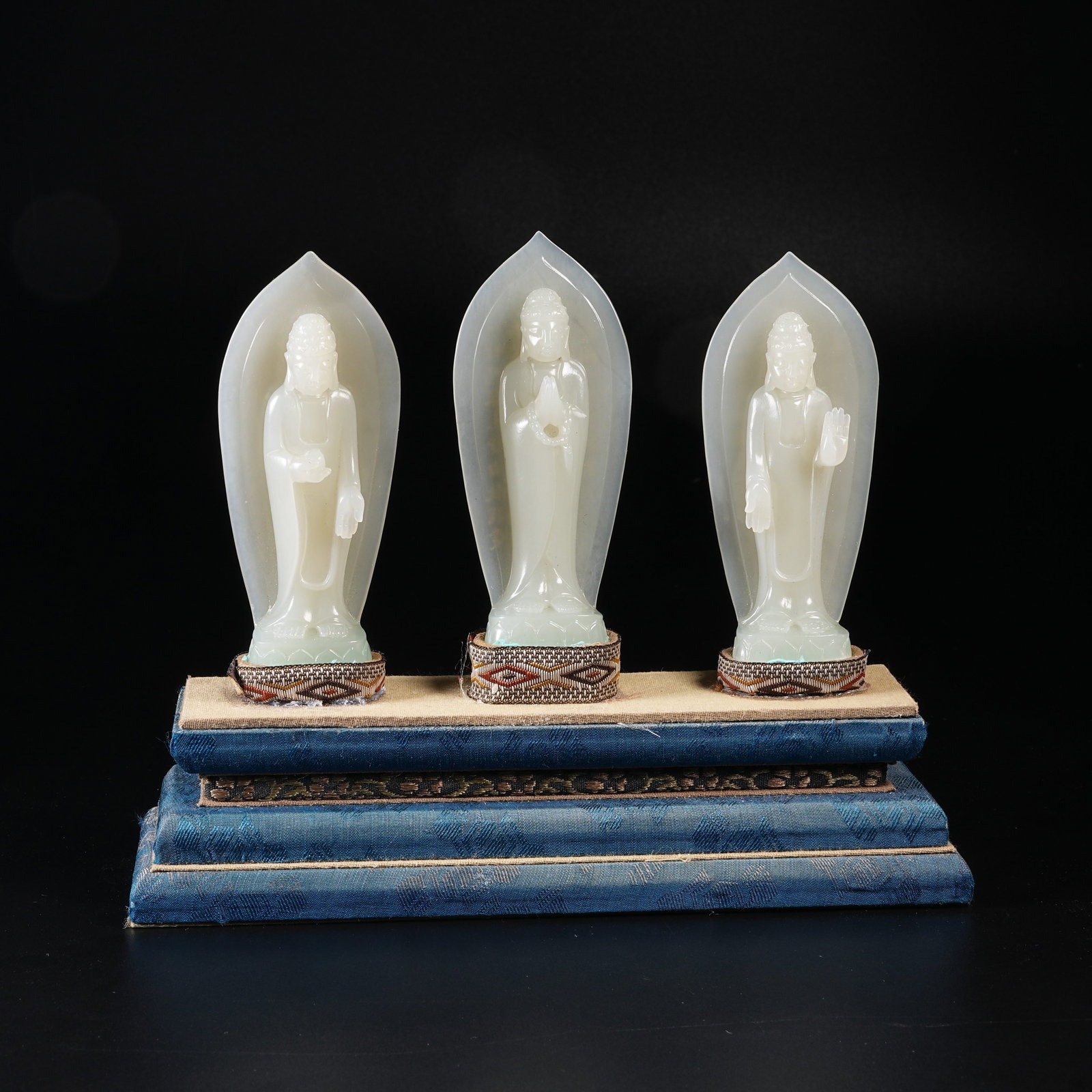 A HETIAN JADE BUDDHA FIGURES (SET) (1 of 11)