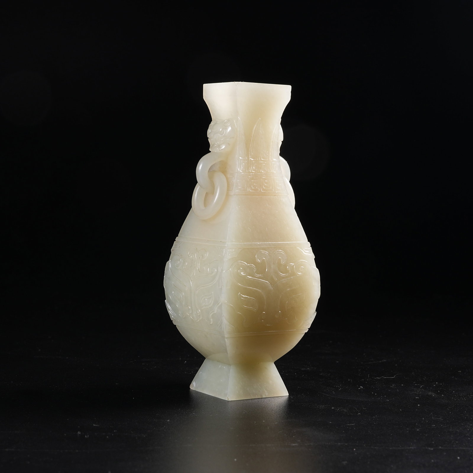 A HETIAN JADE VASE WITH ANIMAL-MASK HANDLES: Hetian Jade Vase with Animal-Mask Handles