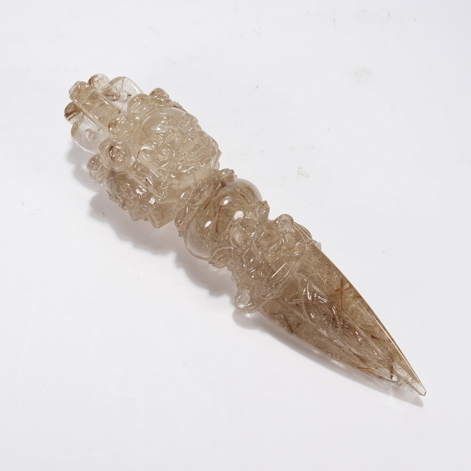 A RUTILATED QUARTZ VAJRA PESTLE (1 of 10)