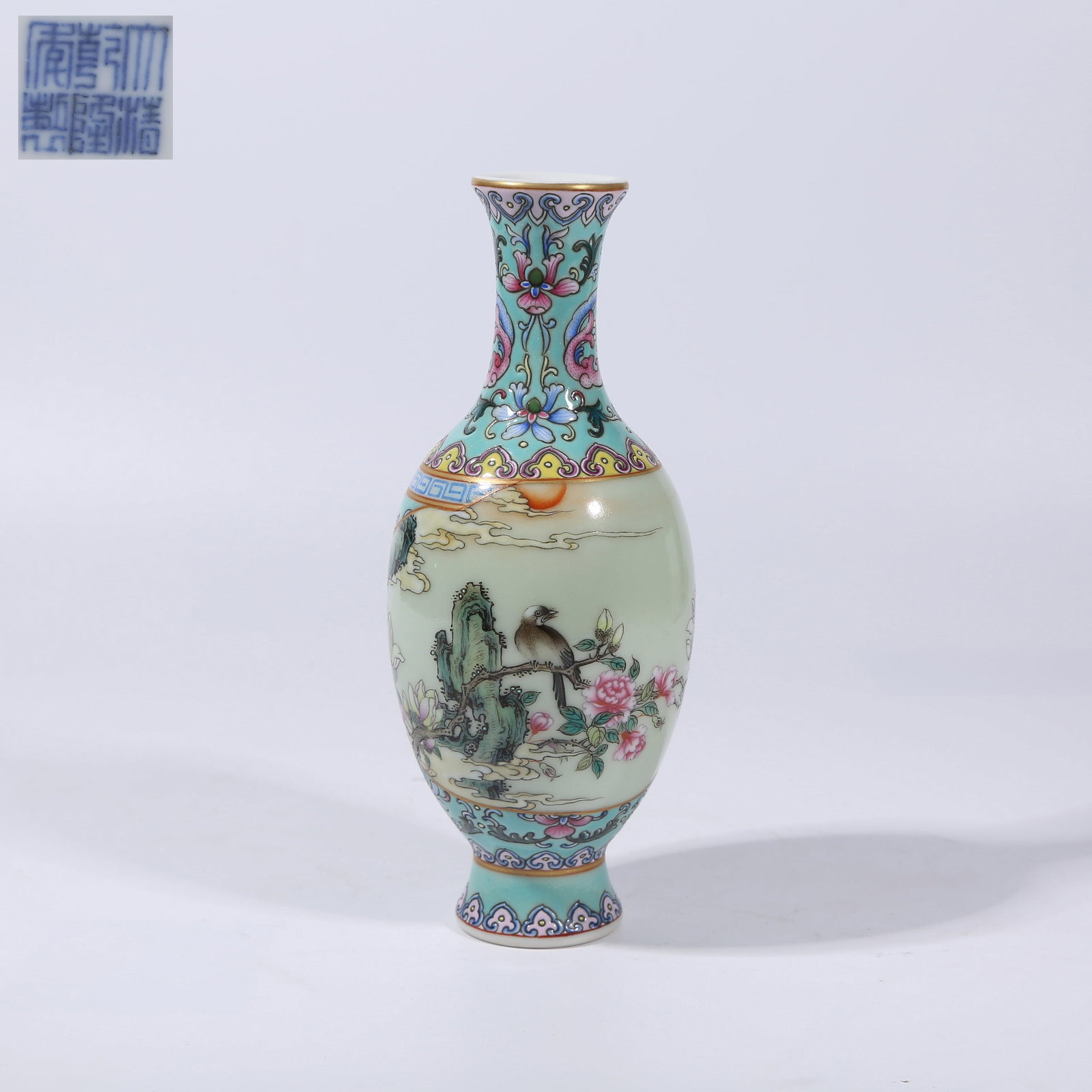 A TURQUOISE-GREEN GROUND OPENWORK FAMILLE ROSE FLORAL AND BIRD PATTERN BUNDLE VASE (1 of 9)