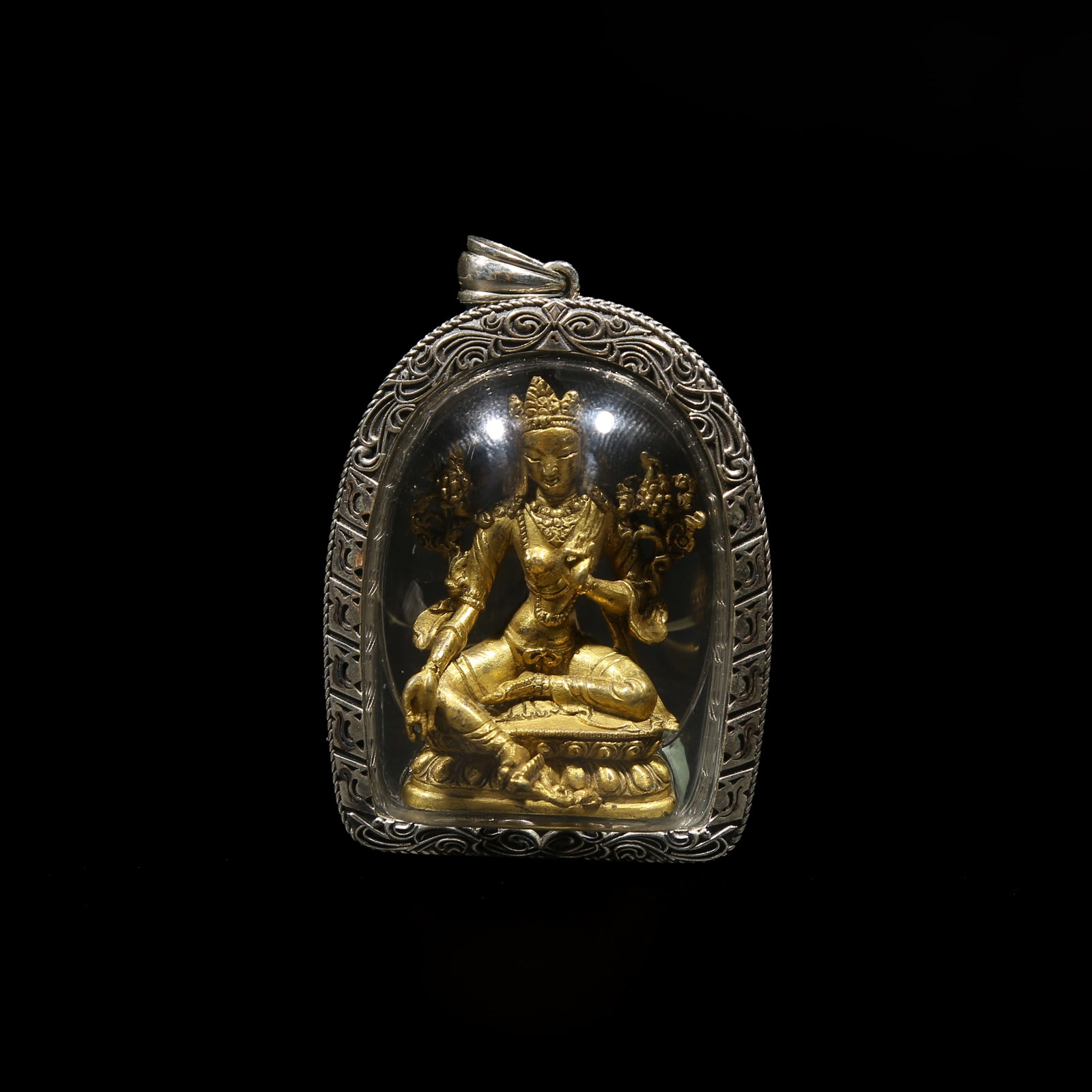 A GILT-BRONZE PORTABLE STATUE OF GREEN TARA (1 of 7)
