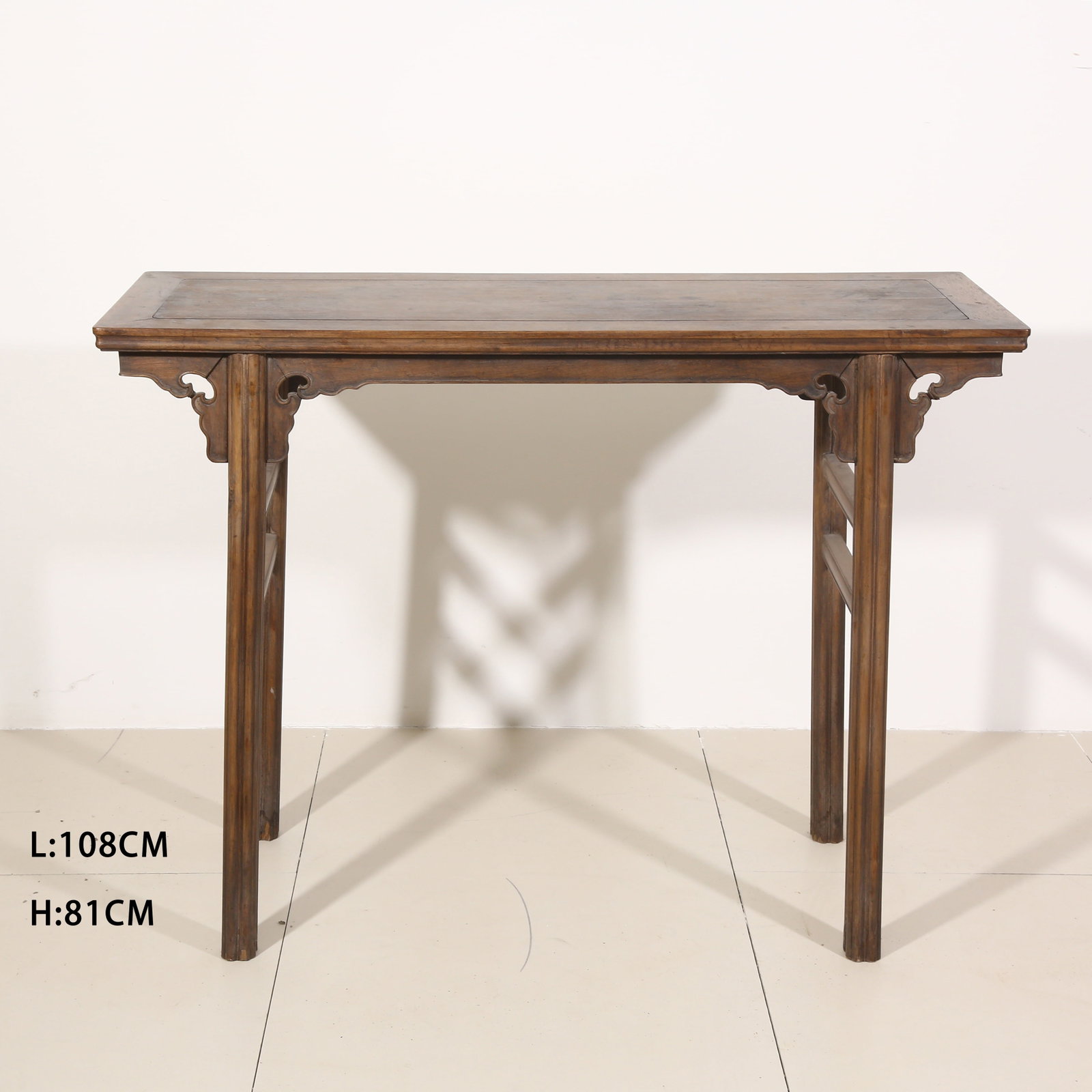 A HUANGHUALI FLAT-TOP TABLE (1 of 10)