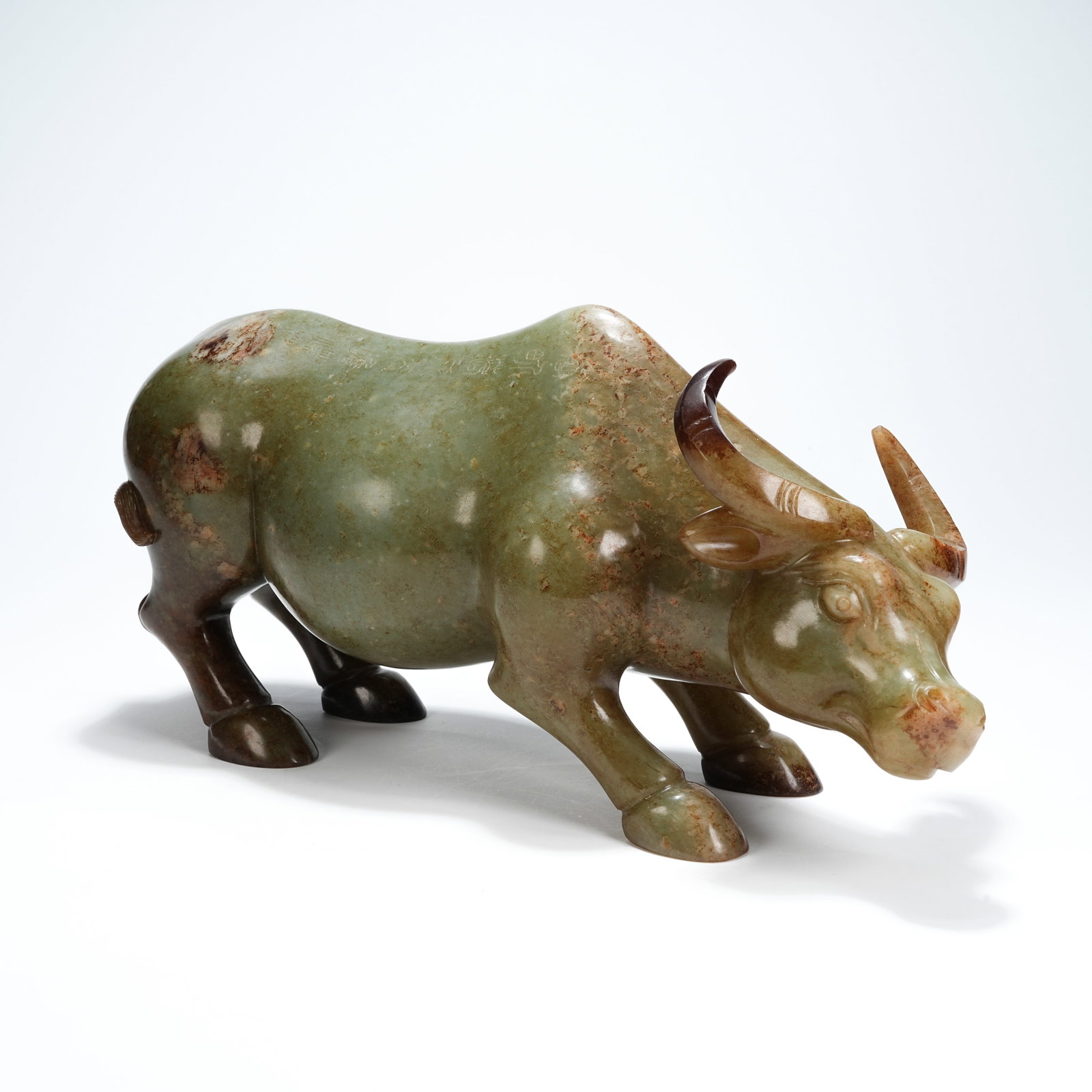 A ARCHAIC JADE OX ORNAMENT (1 of 11)