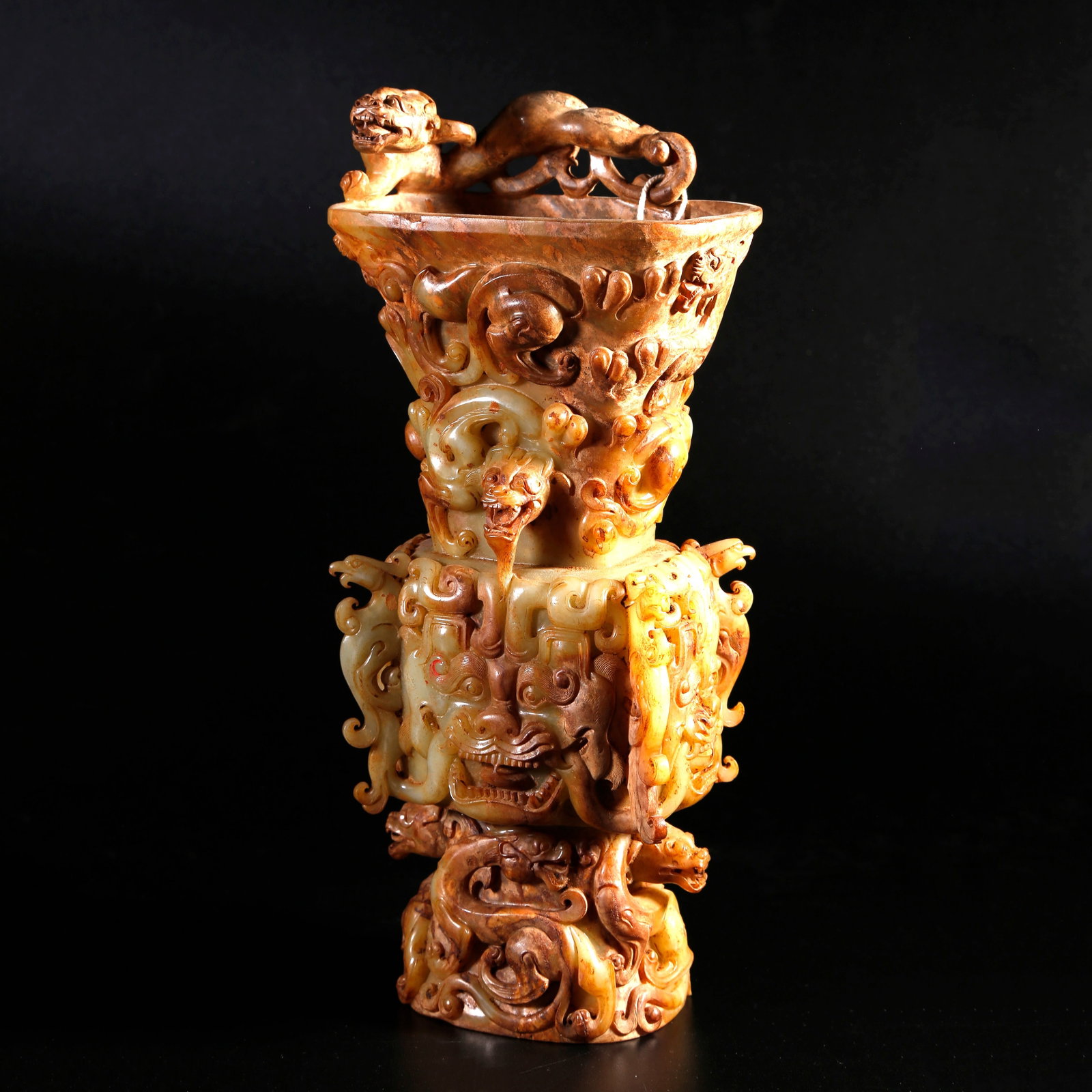 A ARCHAIC JADE CARVED GU BEAKER WITH TAOTIE-MASK AND DRAGON MOTIFS (1 of 10)