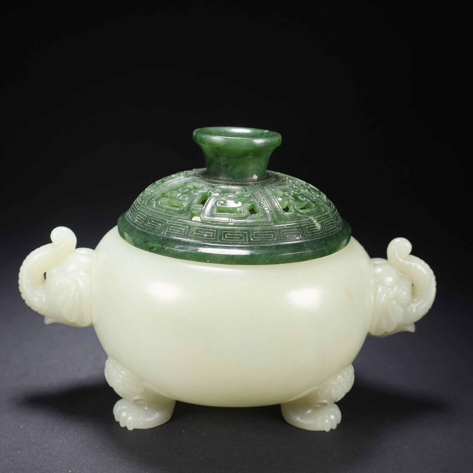 A HETIAN BIYU ELEPHANT-HANDLE HOLLOW-CARVED COVERED CENSER: Hetian Biyu Elephant-Handle Hollow-Carved Covered Censer