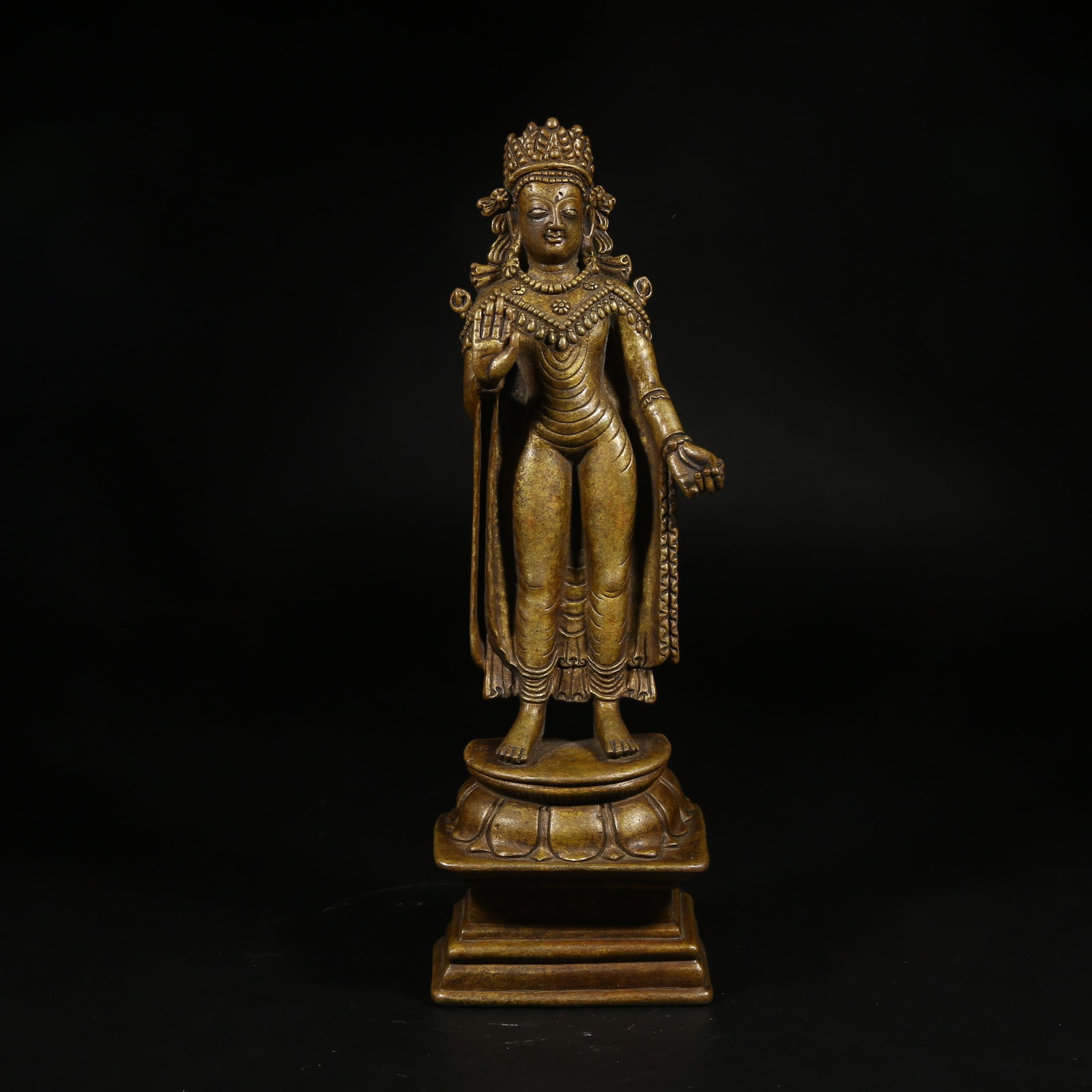 A BRONZE STATUE OF STANDING SHAKYAMUNI IN KASHMIRI STYLE (1 of 8)