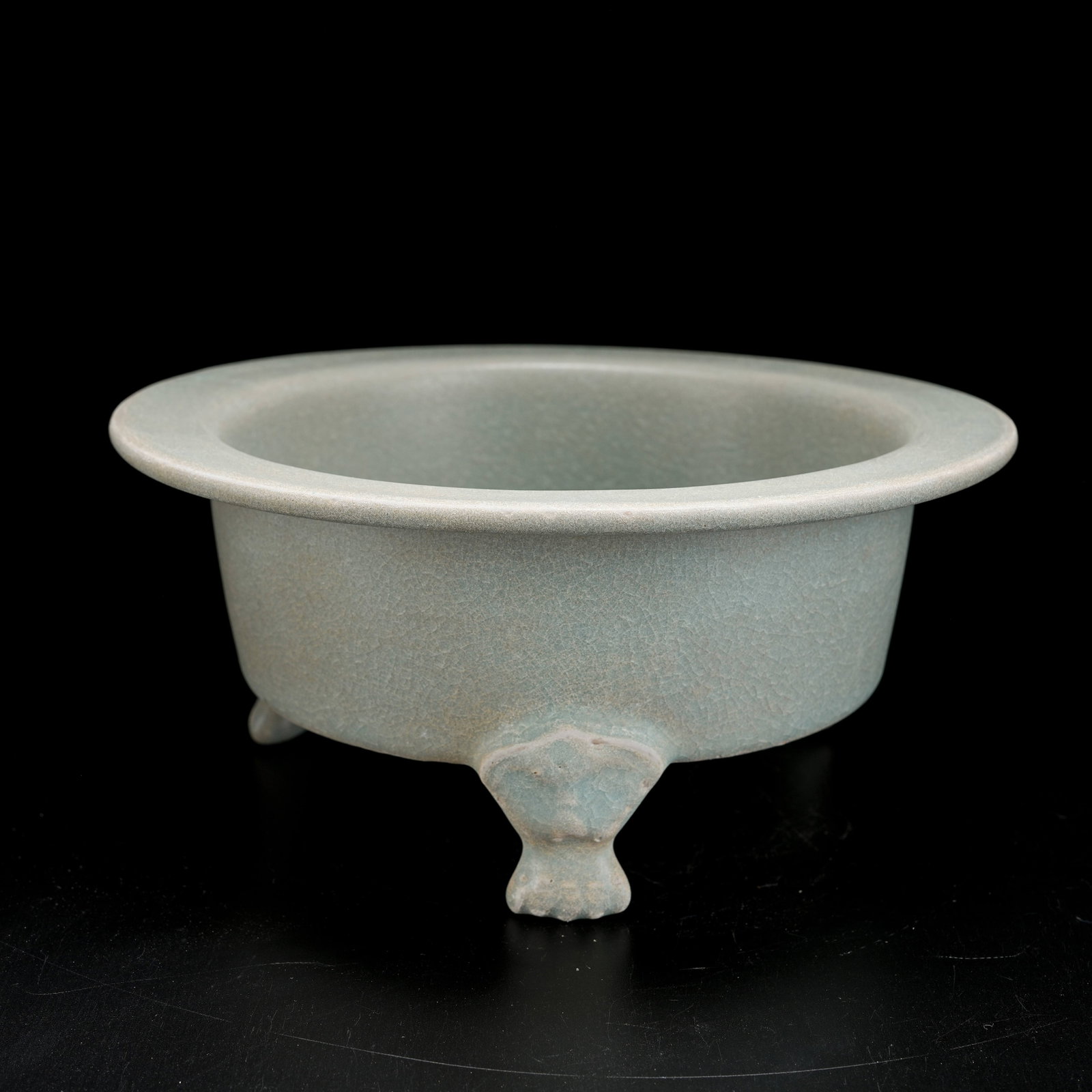 A RU KILN THREE-LEGGED FOLDED-RIM INCENSE BURNER: Ru Kiln Three-Legged Folded-Rim Incense Burner
