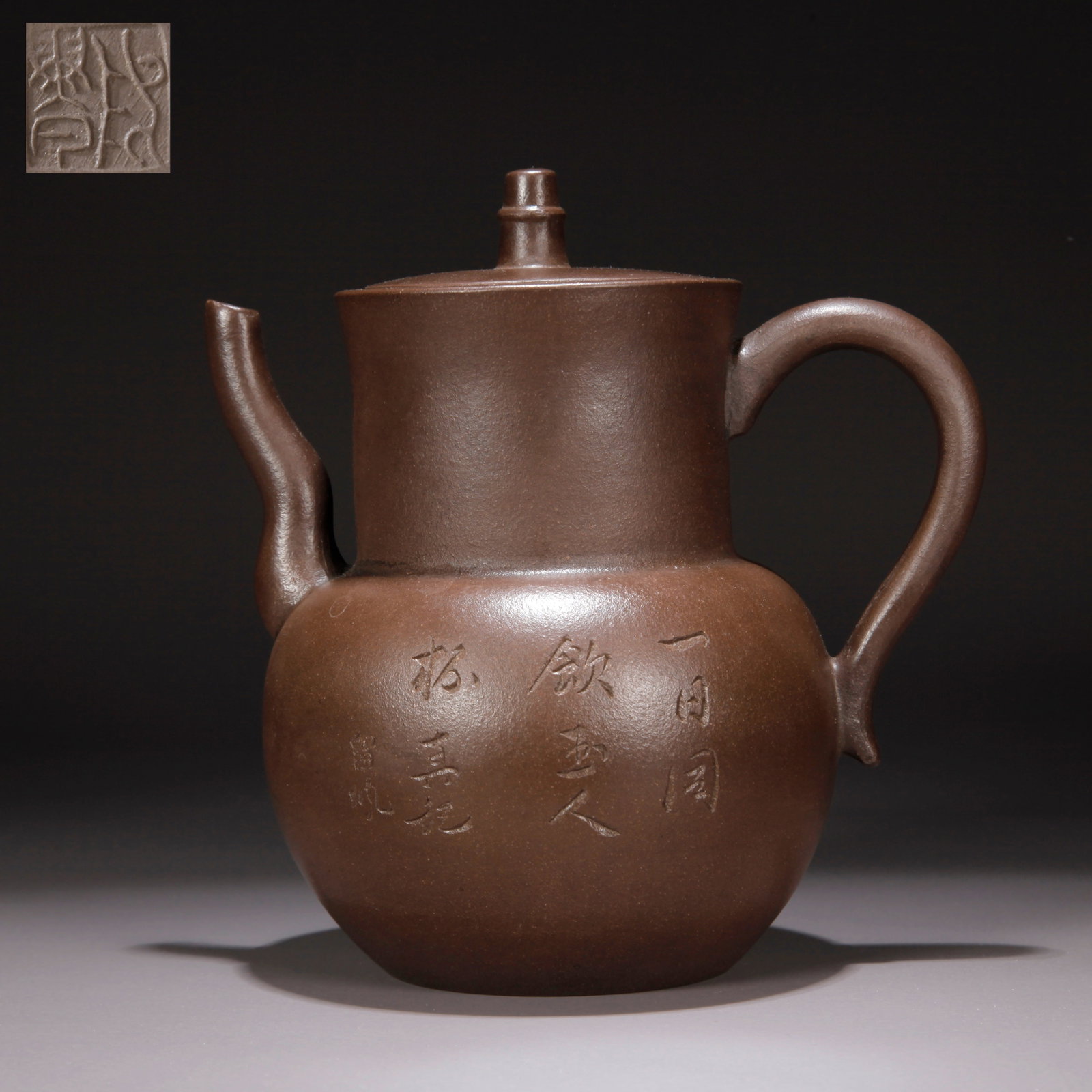 A ZISHA CLAY CARVED POETRY AND CALLIGRAPHY EWER: Zisha Clay Carved Poetry and Calligraphy Ewer