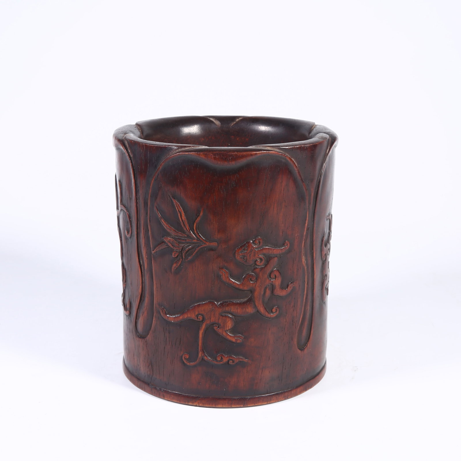 A HUANGHUALI BRUSH POT WITH CHI DRAGON PATTERN (1 of 8)
