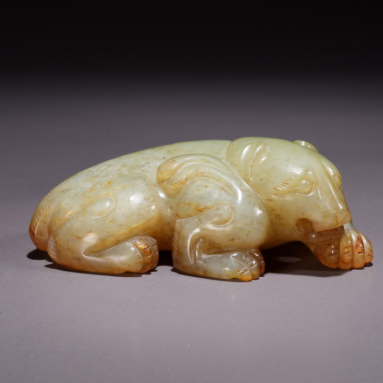 A HETIAN JADE BEAST-SHAPED ORNAMENT (1 of 11)