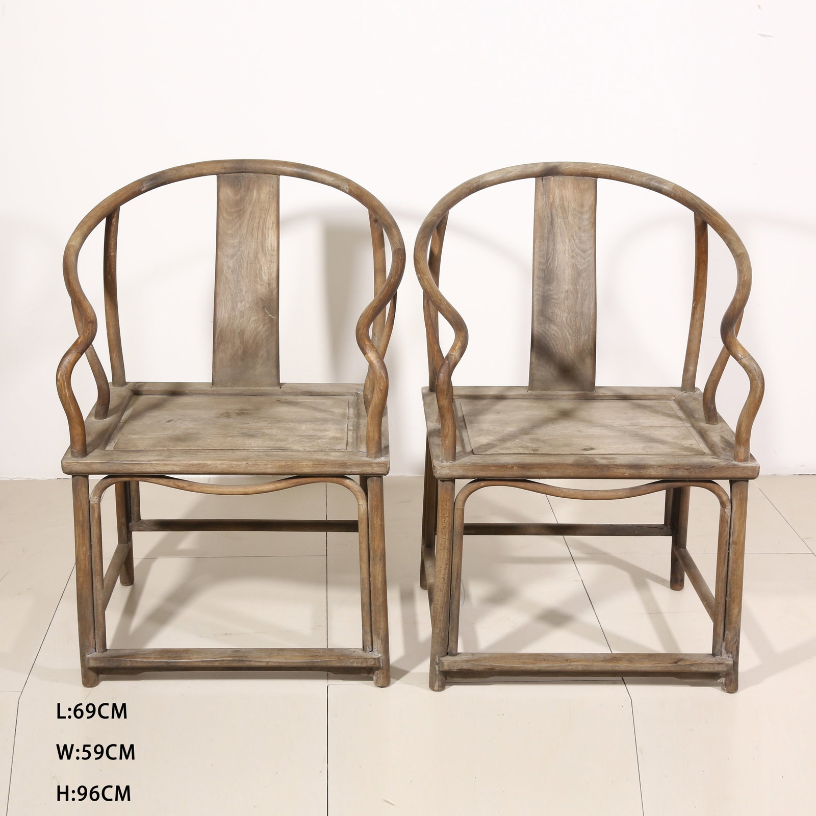 A SET OF HUANGHUALI ROUND-BACK ARMCHAIRS (QUANYI): Set of Huanghuali Round-back Armchairs (Quanyi)