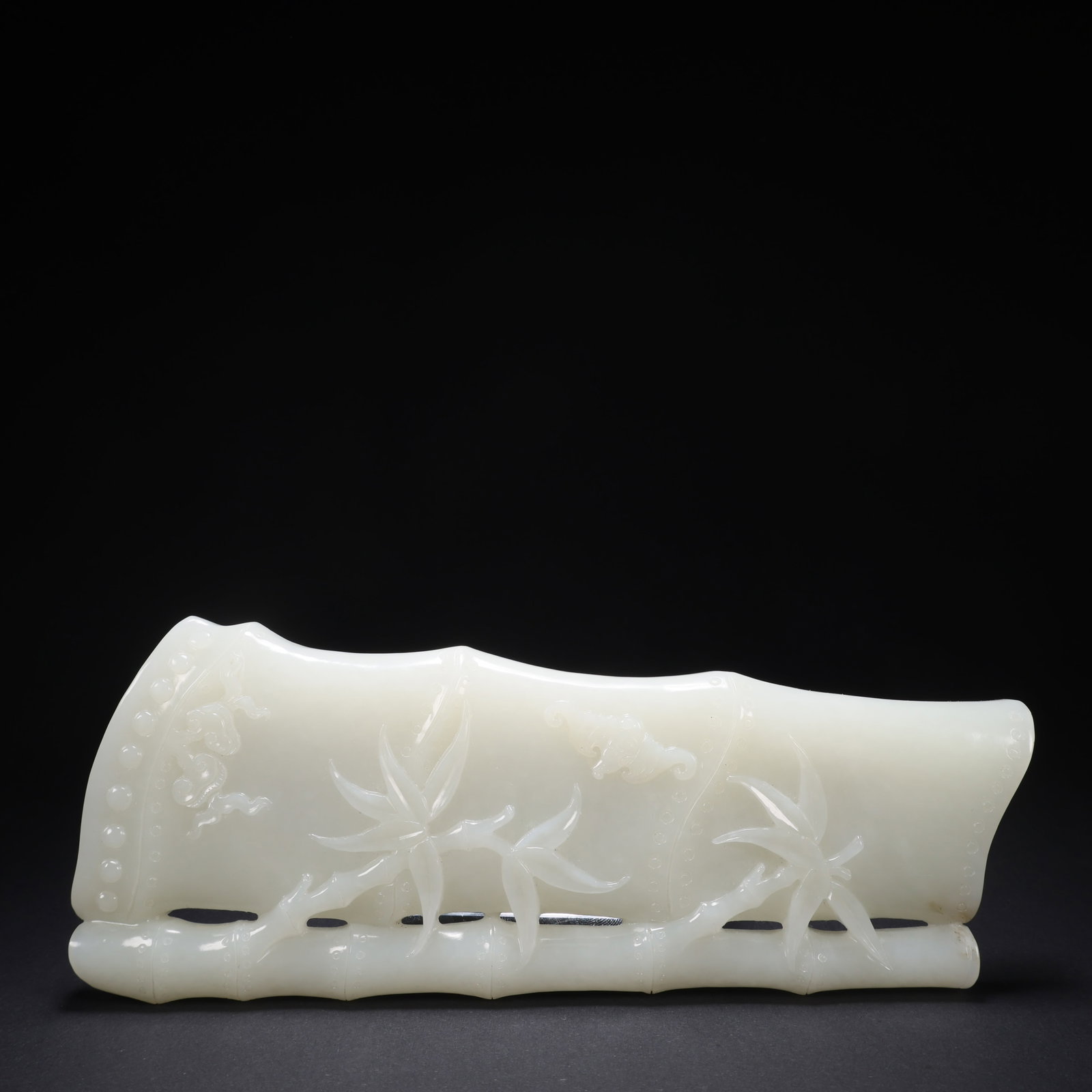A HETIAN JADE "BAMBOO HERALDS PEACE" INSCRIBED PAPERWEIGHT (1 of 9)