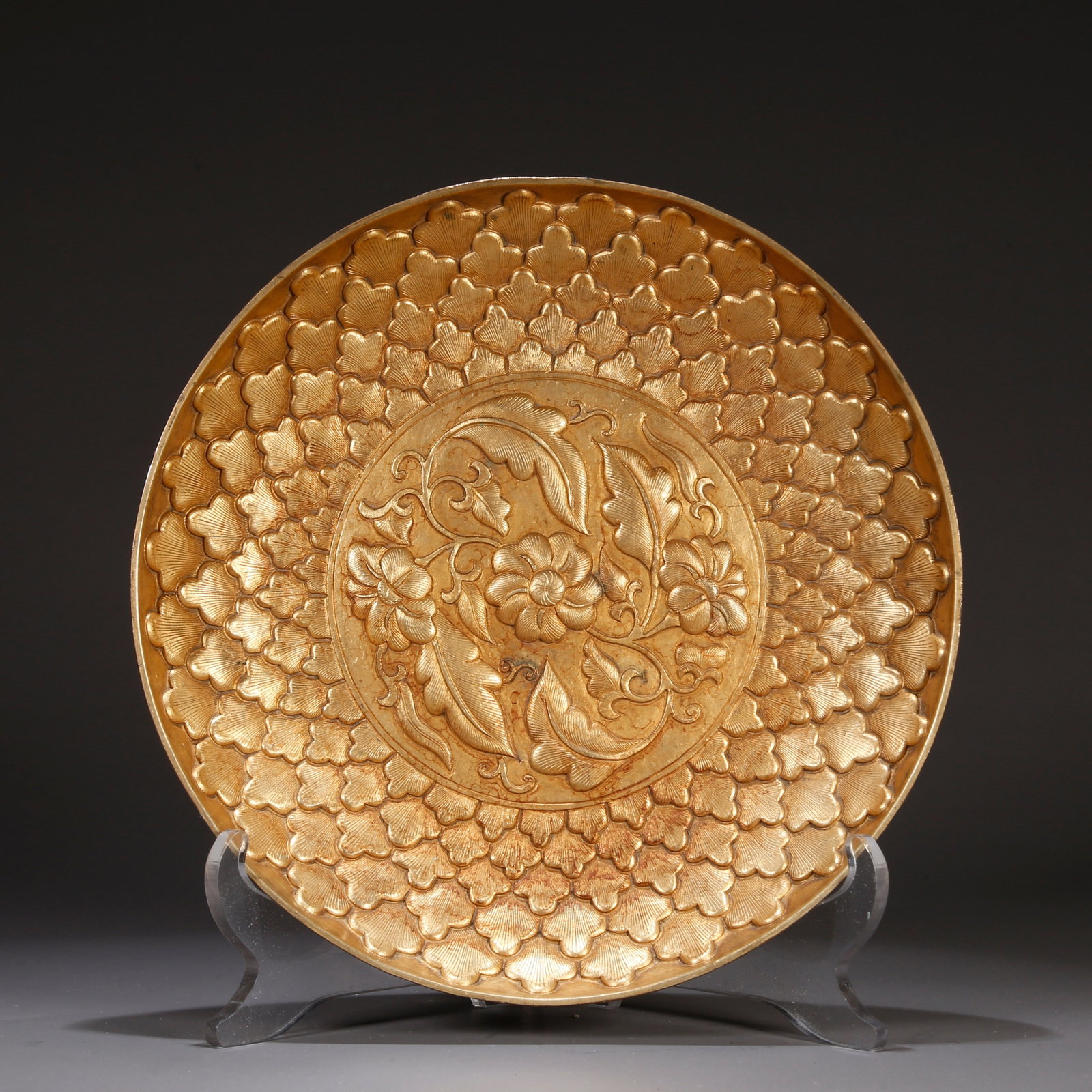 A GILT BRONZE PLATE WITH FLORAL DESIGN: Gilt bronze plate with floral design