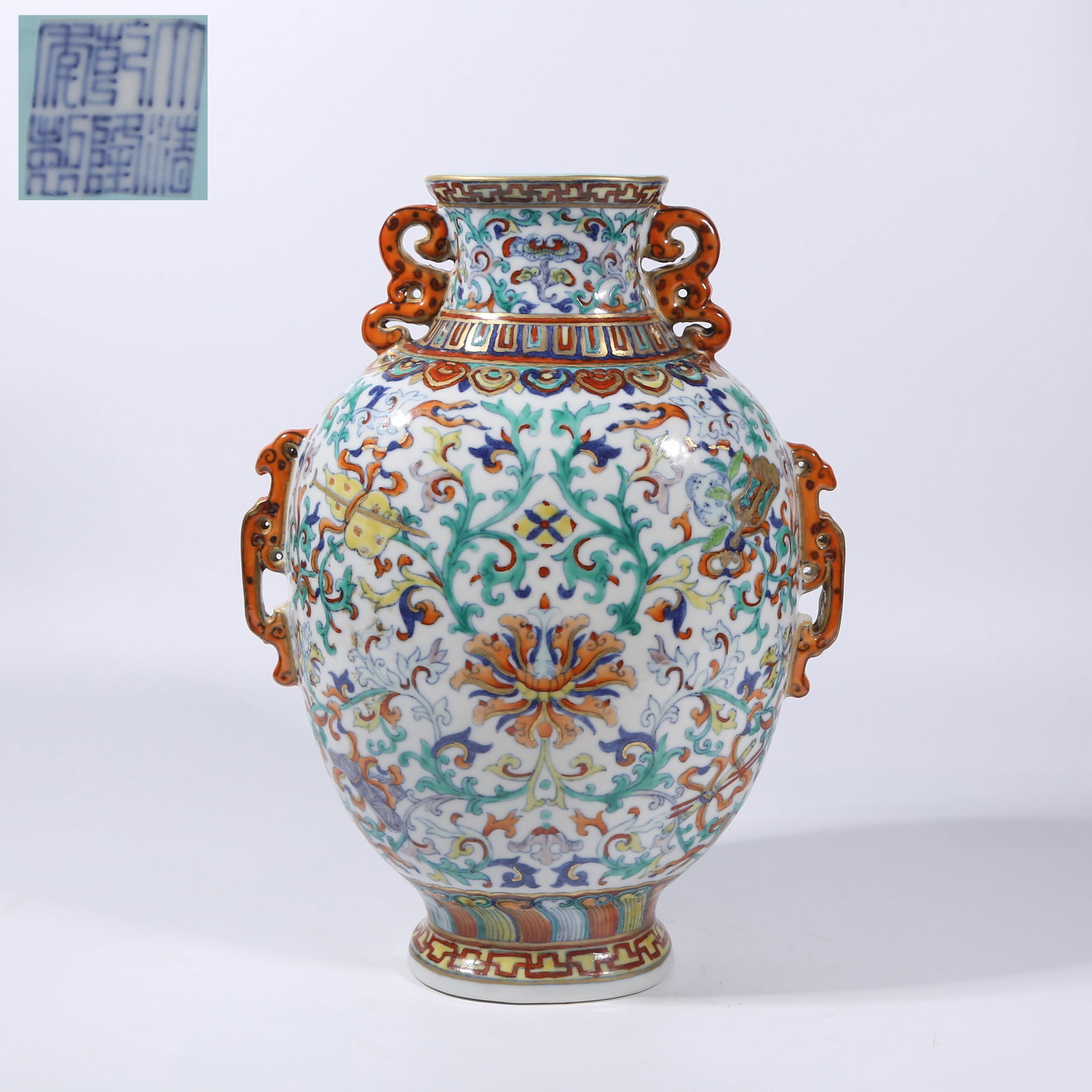 A DOUCAI "EIGHT IMMORTALS AND PRECIOUS LOTUS" DOUBLE-EARED VASE (1 of 9)