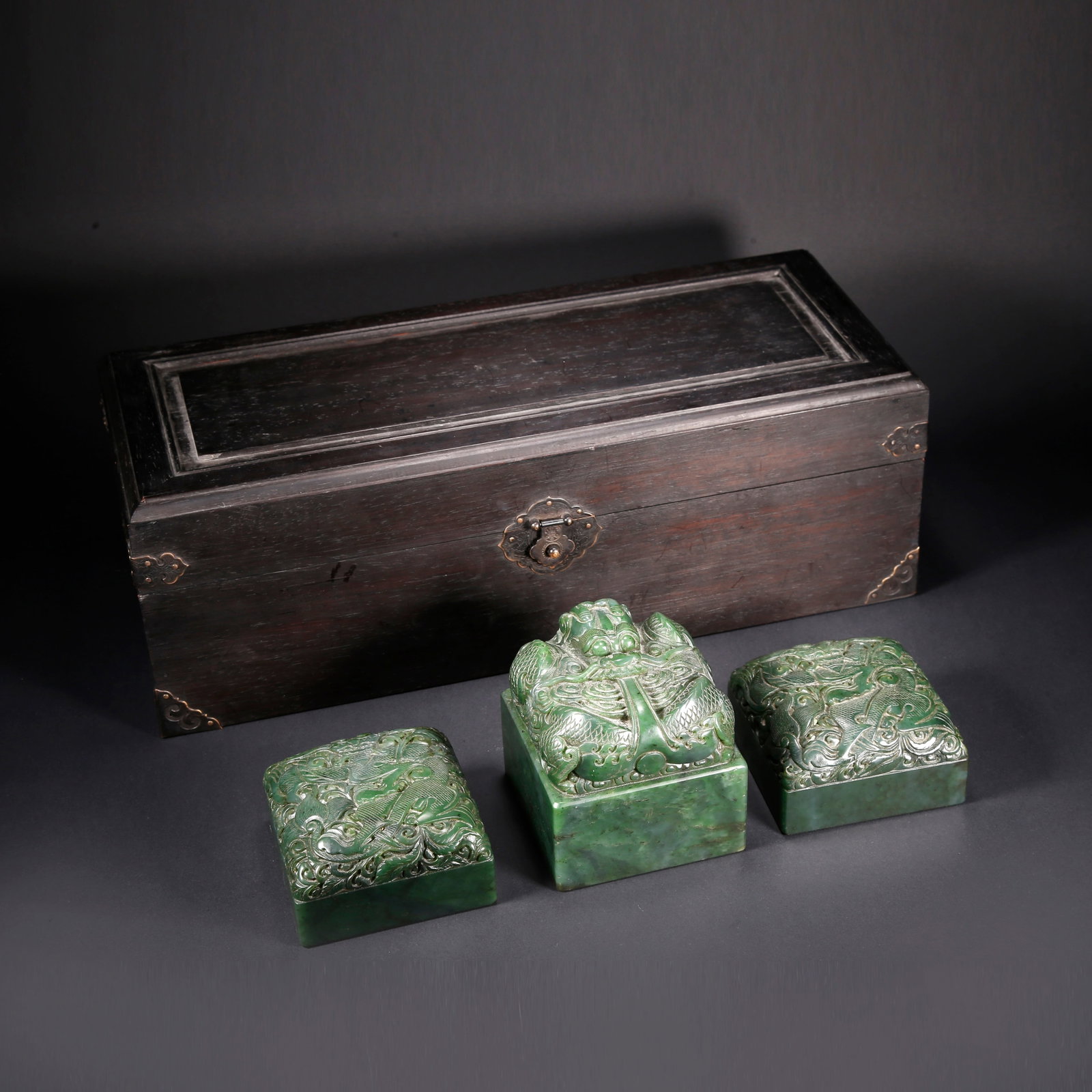 A HETIAN BIYU DRAGON-HEAD SEAL SET (1 of 11)