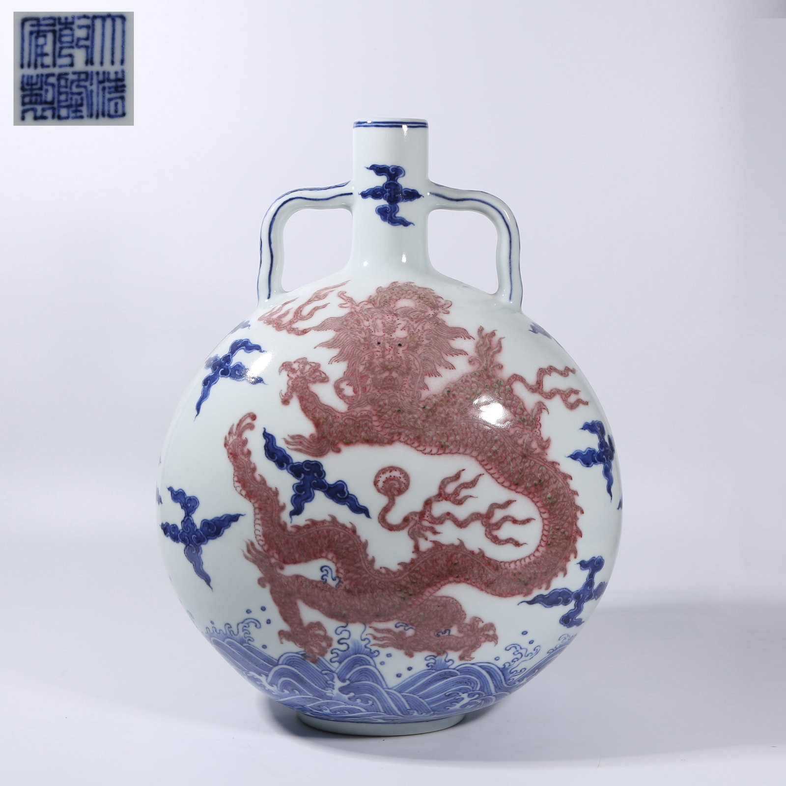 A BLUE AND WHITE WITH UNDERGLAZE RED "SEA WAVE DRAGON" MOON-EMBRACING VASE (1 of 10)