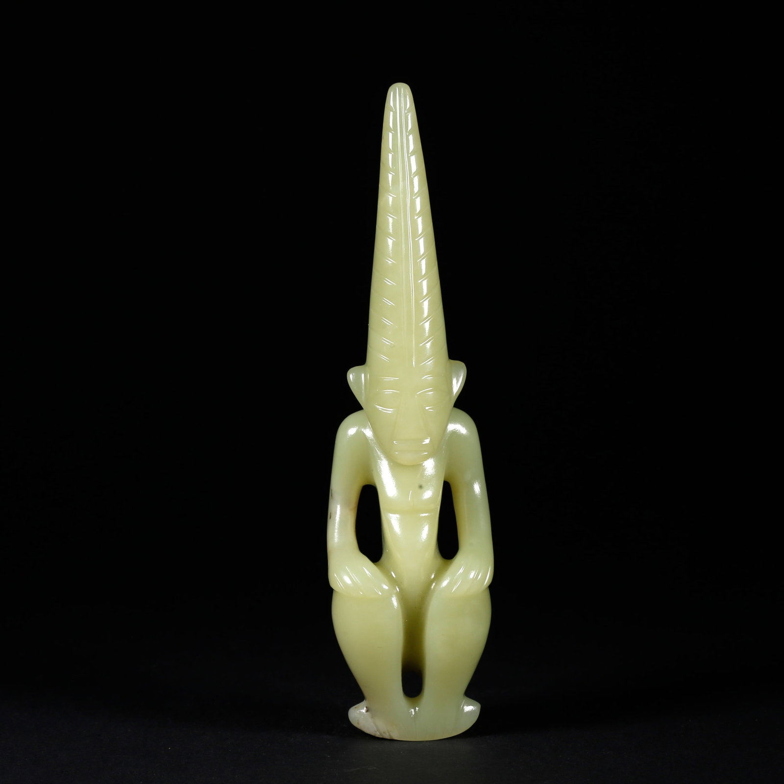 A HETIAN JADE SEATED DEITY FIGURE (1 of 8)