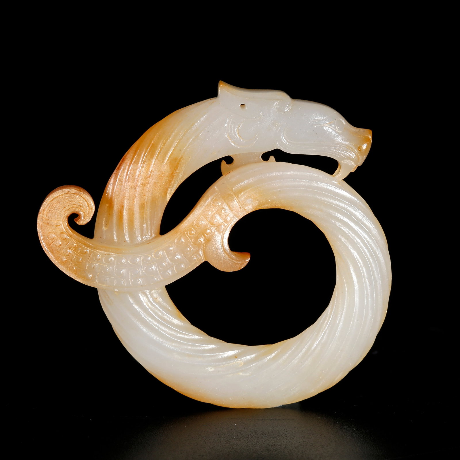 A HETIAN JADE CARVED PENDANT WITH DRAGON MOTIF (1 of 9)